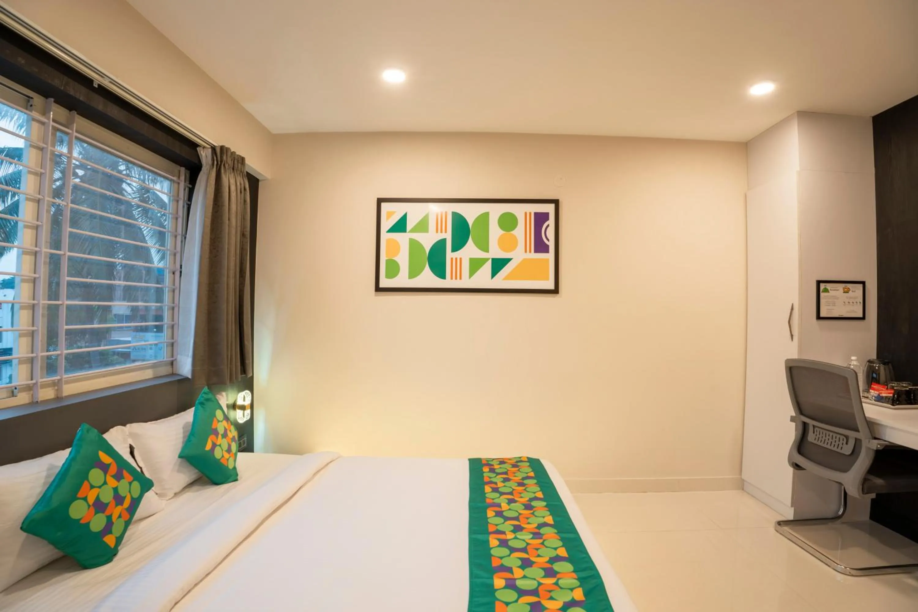 Bedroom, Bed in Treebo Sanmaya Retreat, 15 Mins From Mysore Palace