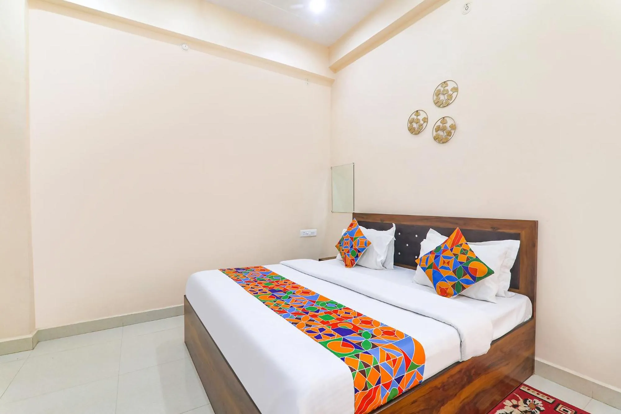 Bed in FabHotel RK Palace