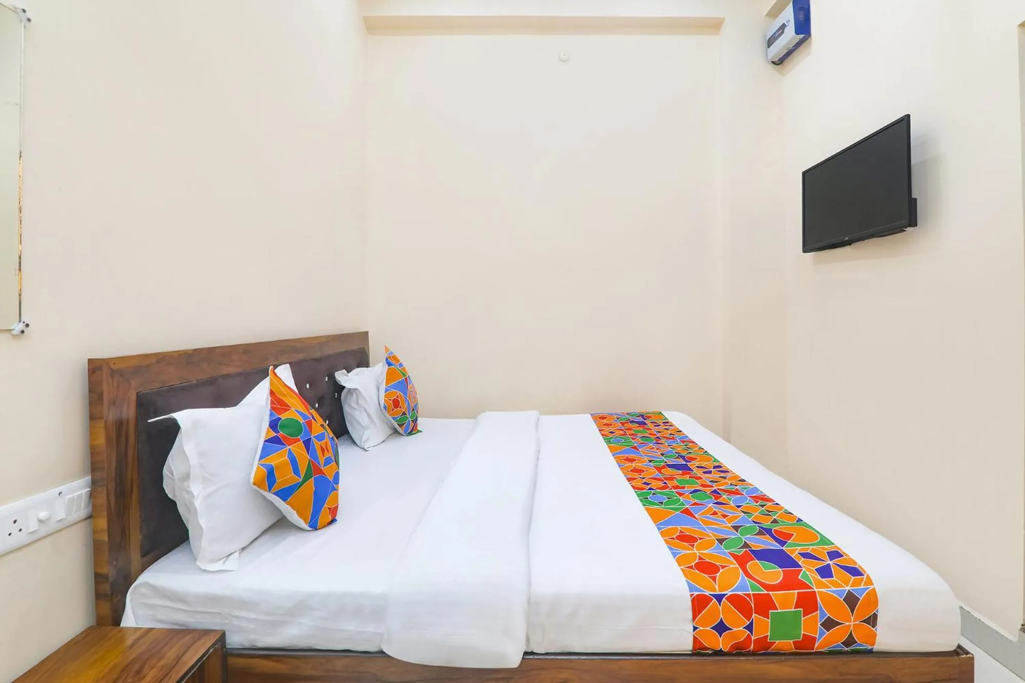 Bed in FabHotel RK Palace