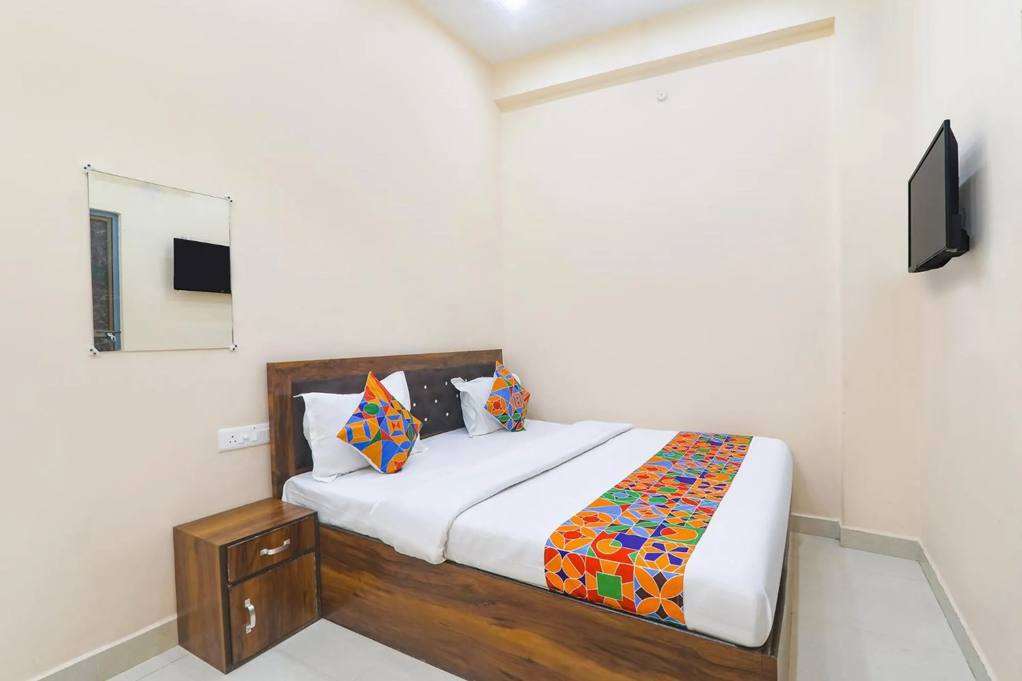 Bed in FabHotel RK Palace