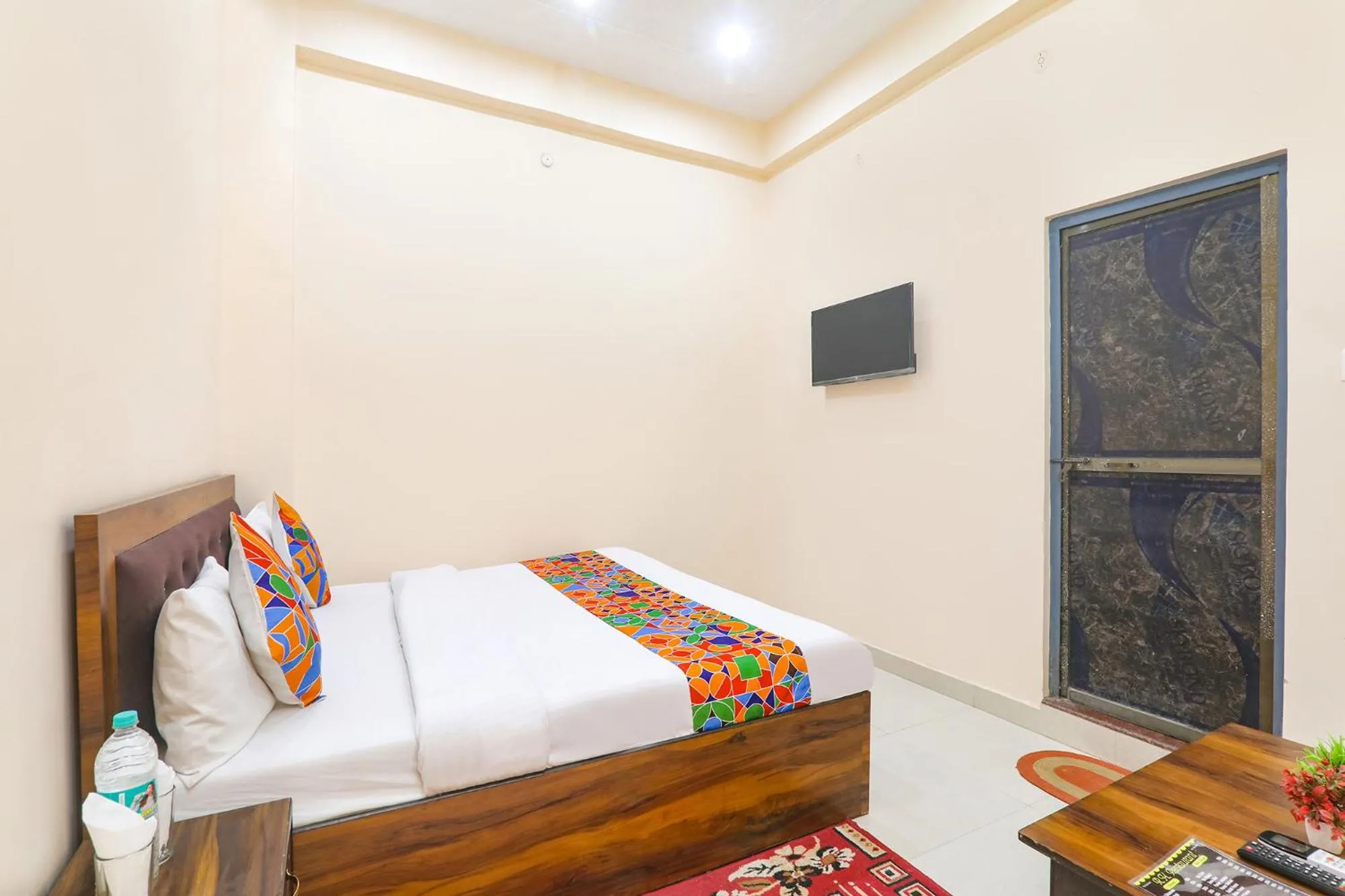 Bed in FabHotel RK Palace