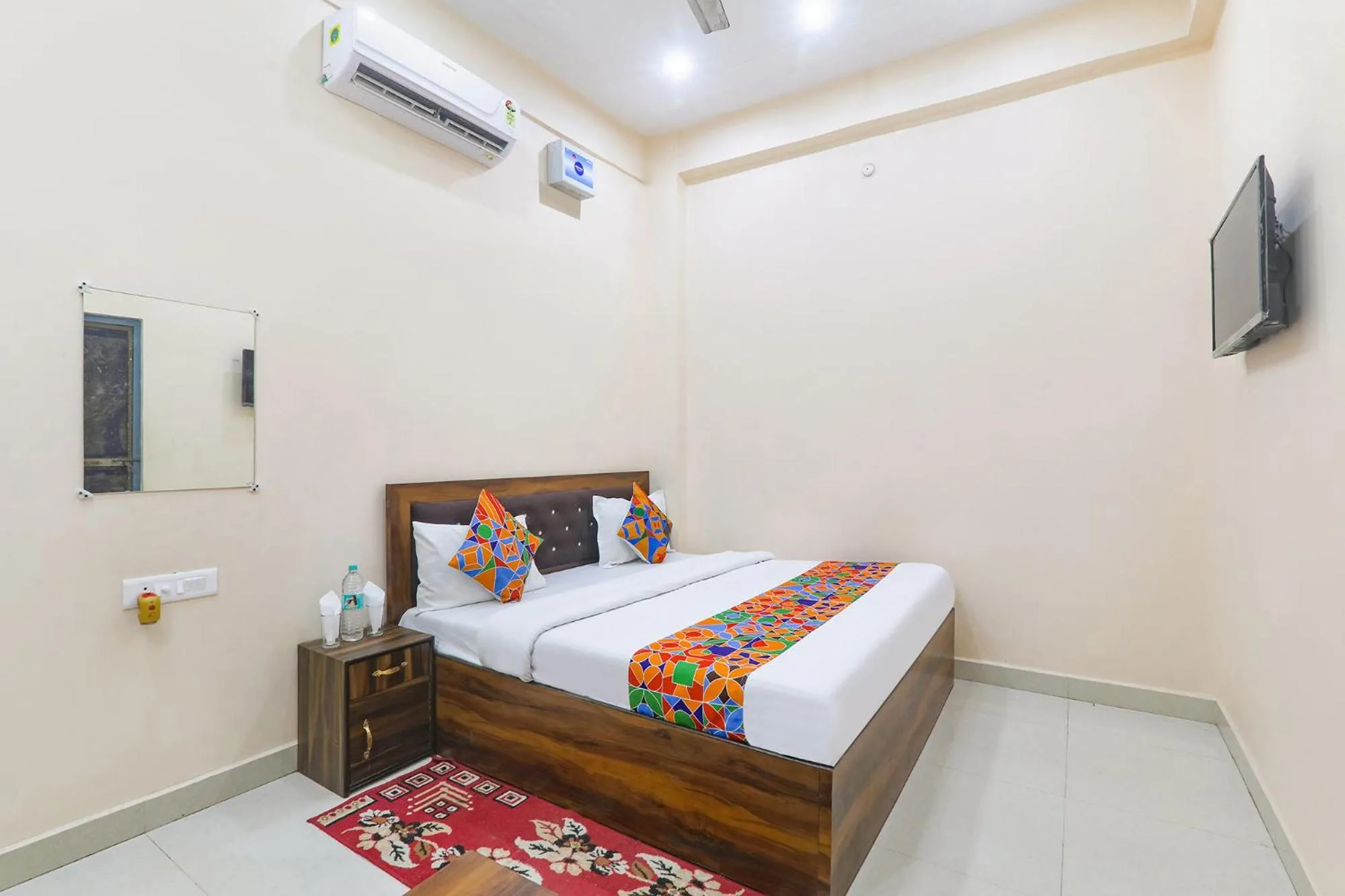 Bed in FabHotel RK Palace