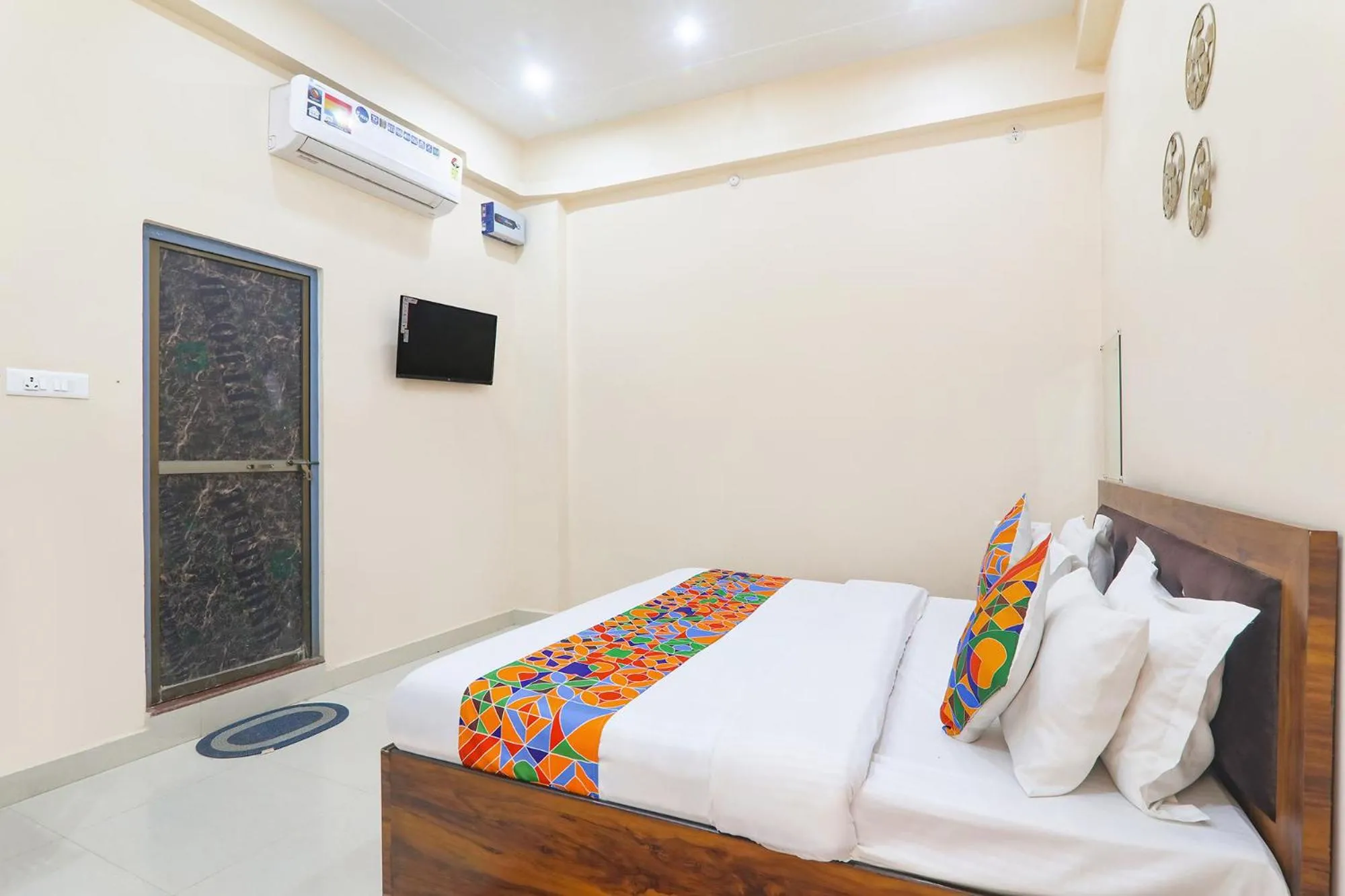 Bed in FabHotel RK Palace