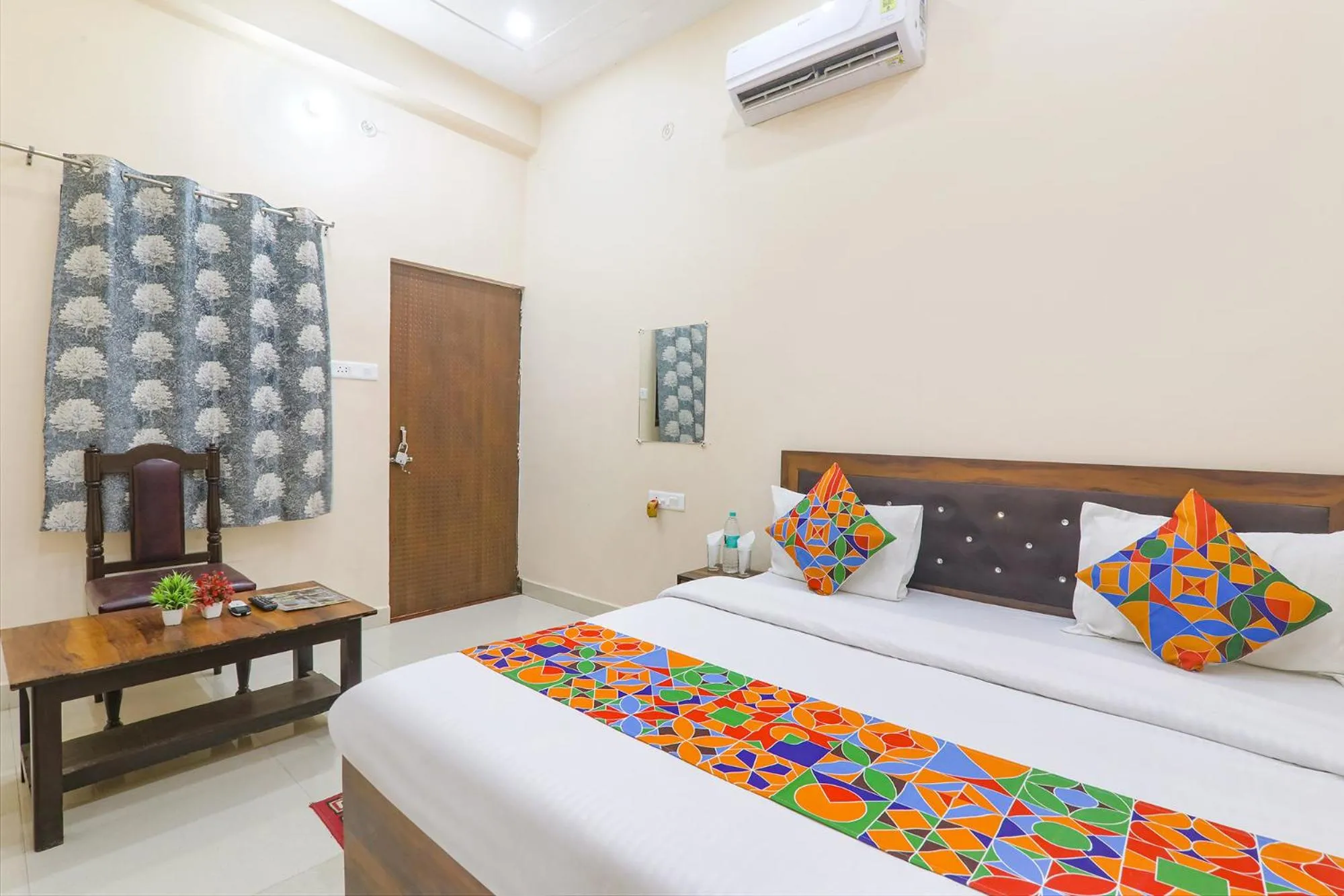 Bed in FabHotel RK Palace