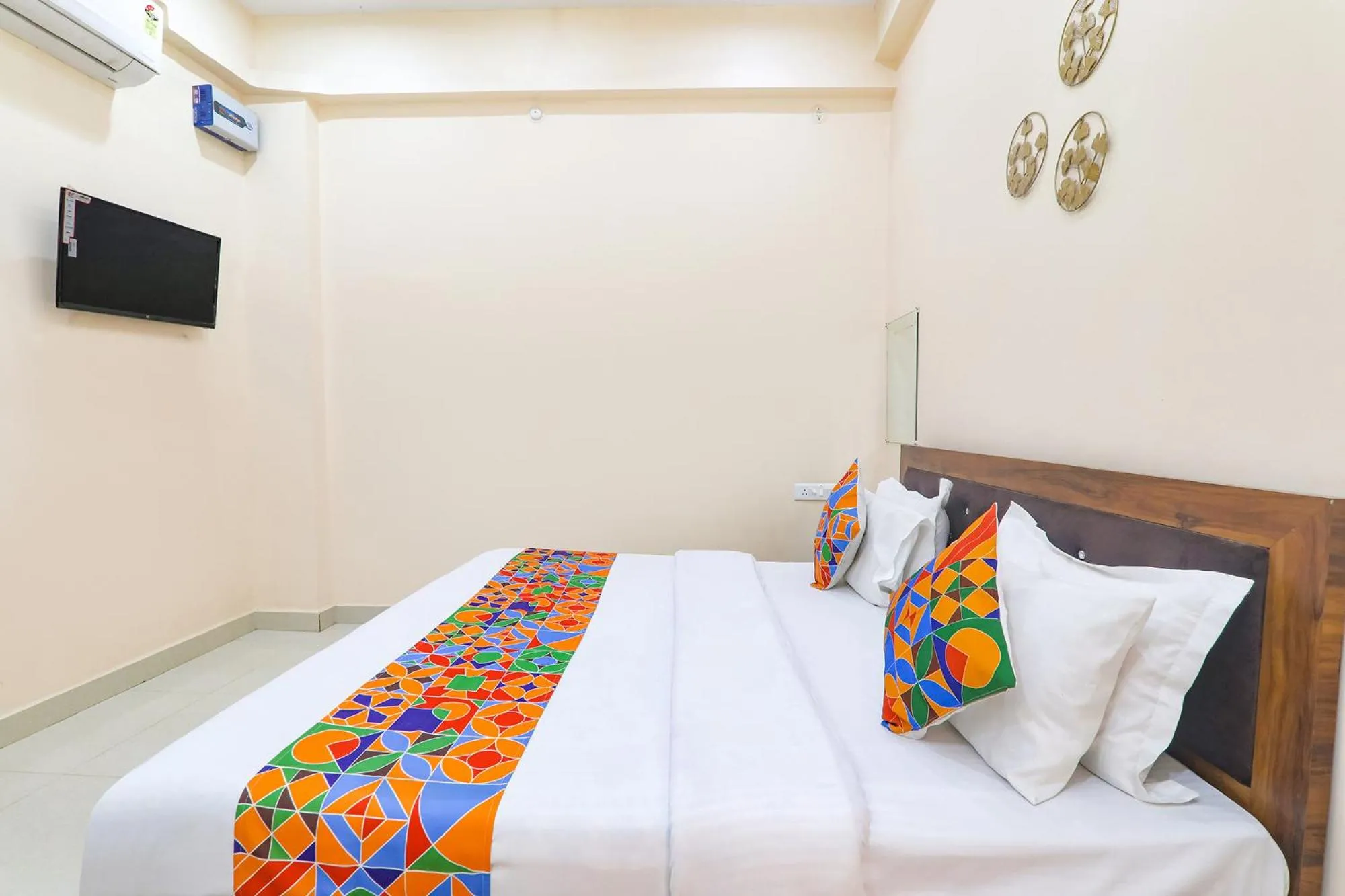 Bed in FabHotel RK Palace