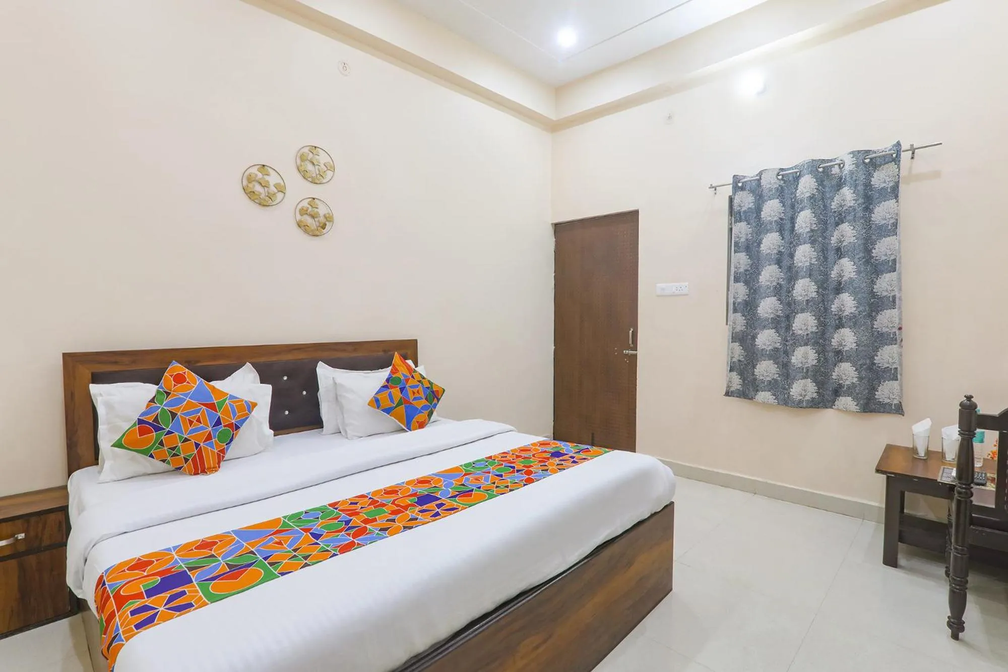 Bed in FabHotel RK Palace