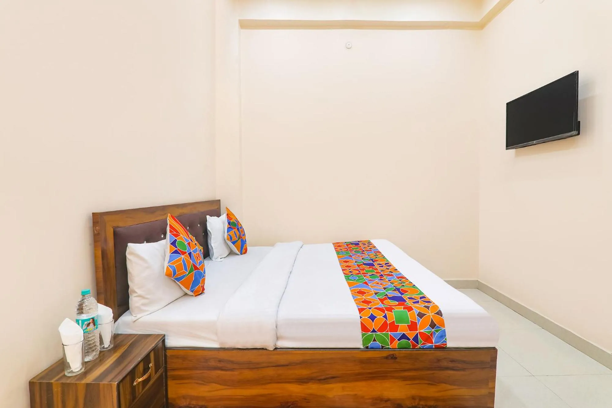 Bed in FabHotel RK Palace