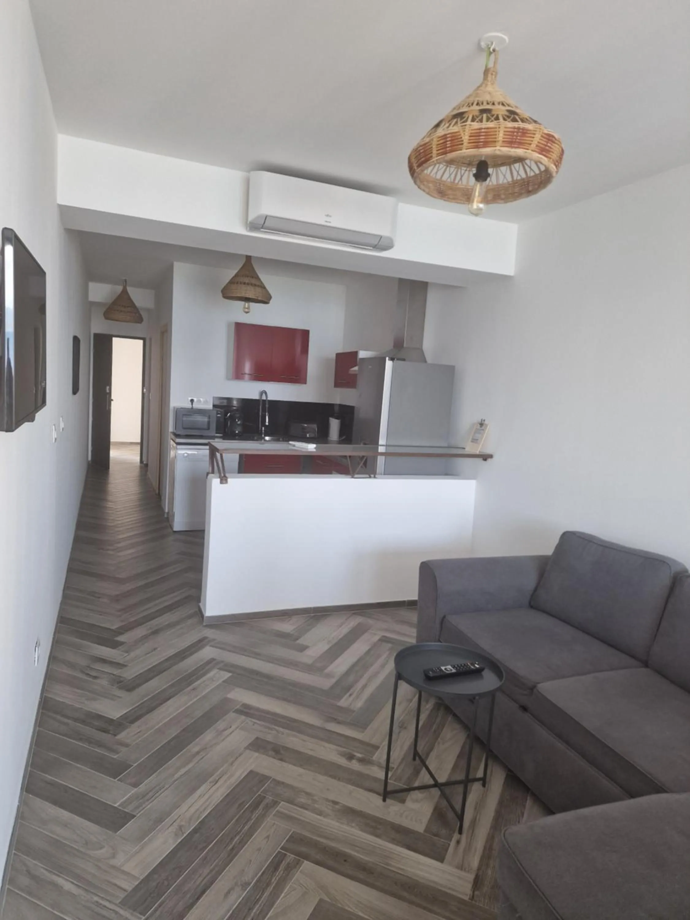 Communal lounge/ TV room in Hotel L'Escale