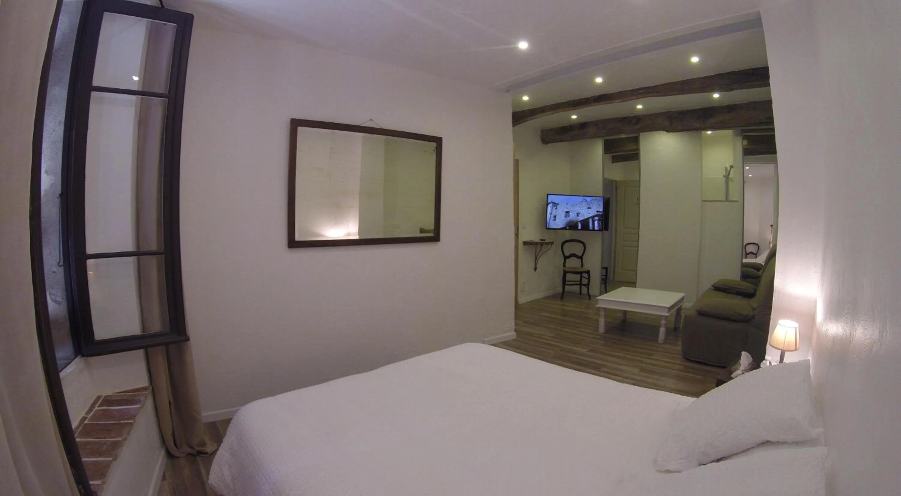 Living room, Bed in Maison Carles BnB