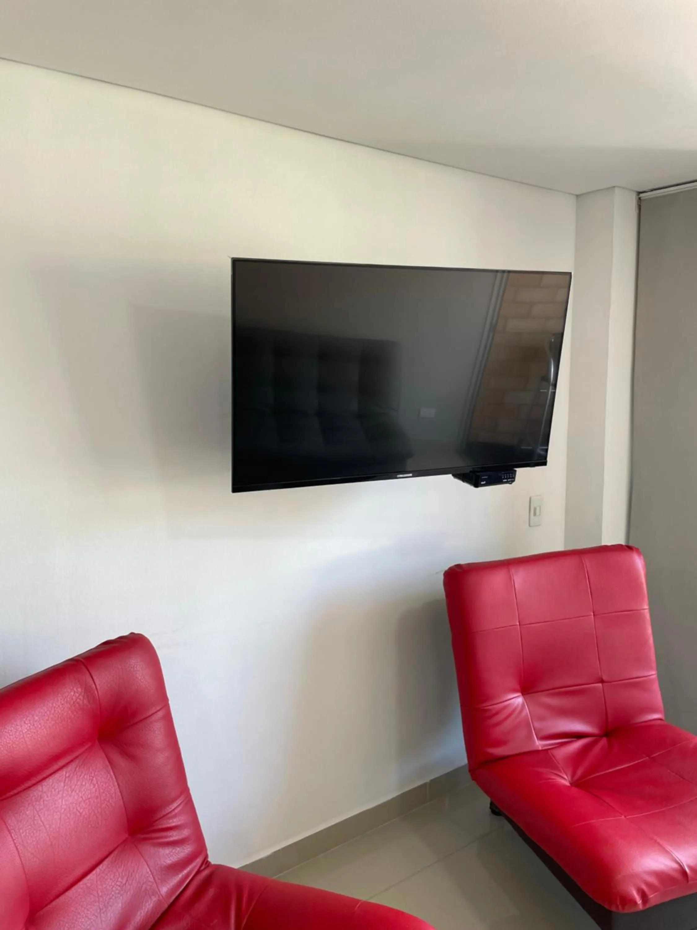 TV and multimedia in Ivanna Jumar ApartaHotel - Laureles Estadio