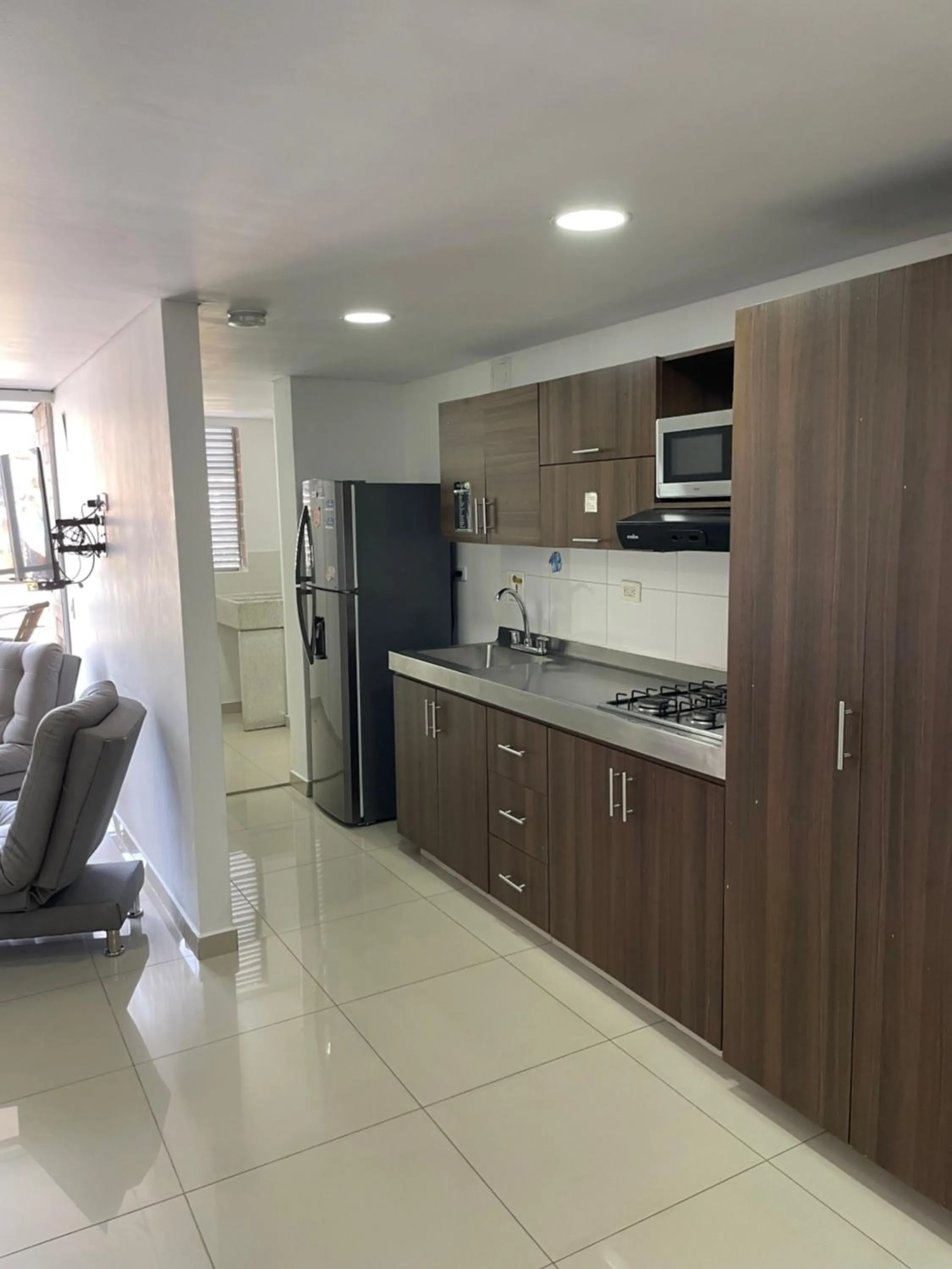 Kitchen or kitchenette in Ivanna Jumar ApartaHotel - Laureles Estadio