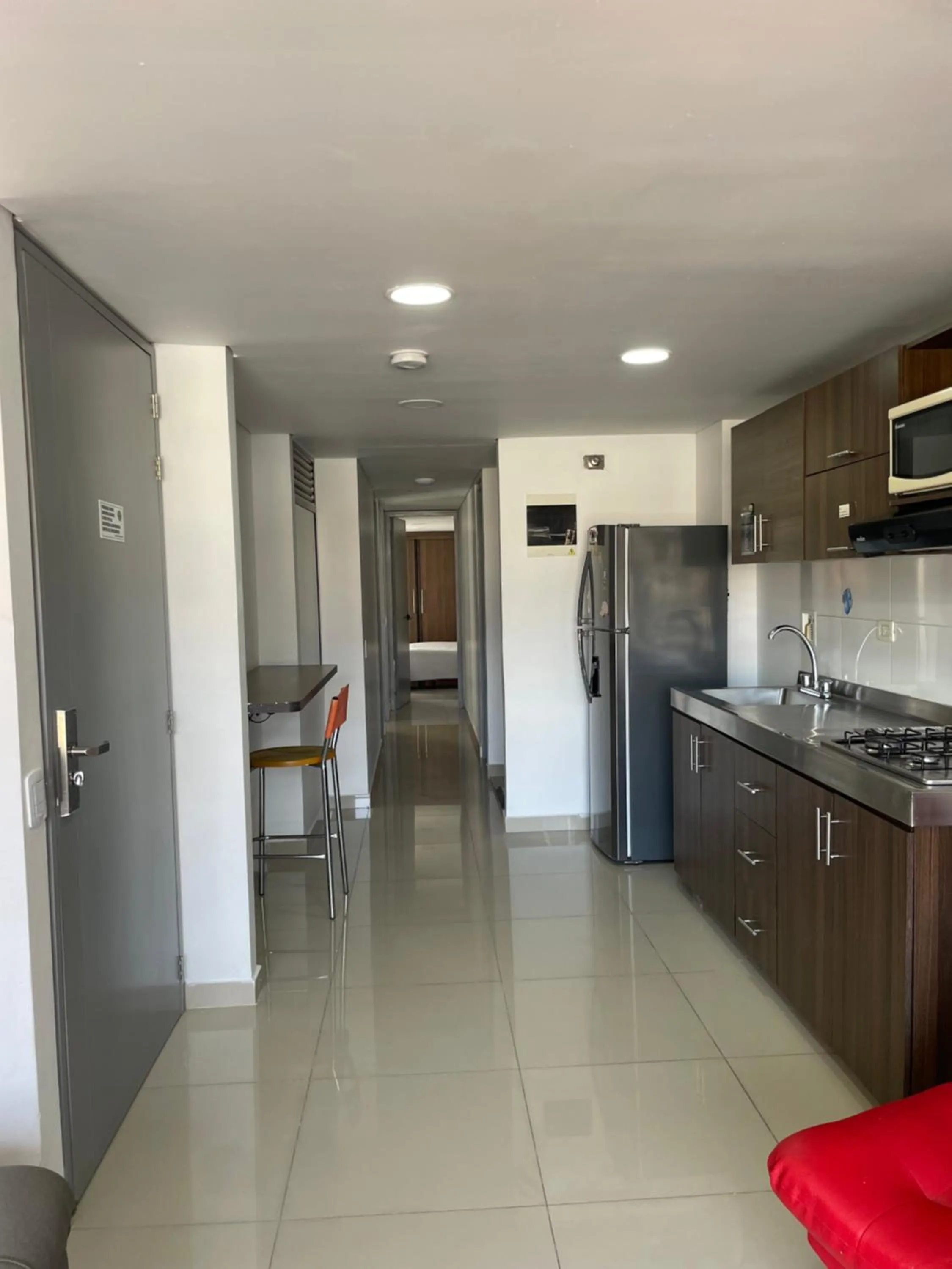 Kitchen or kitchenette in Ivanna Jumar ApartaHotel - Laureles Estadio