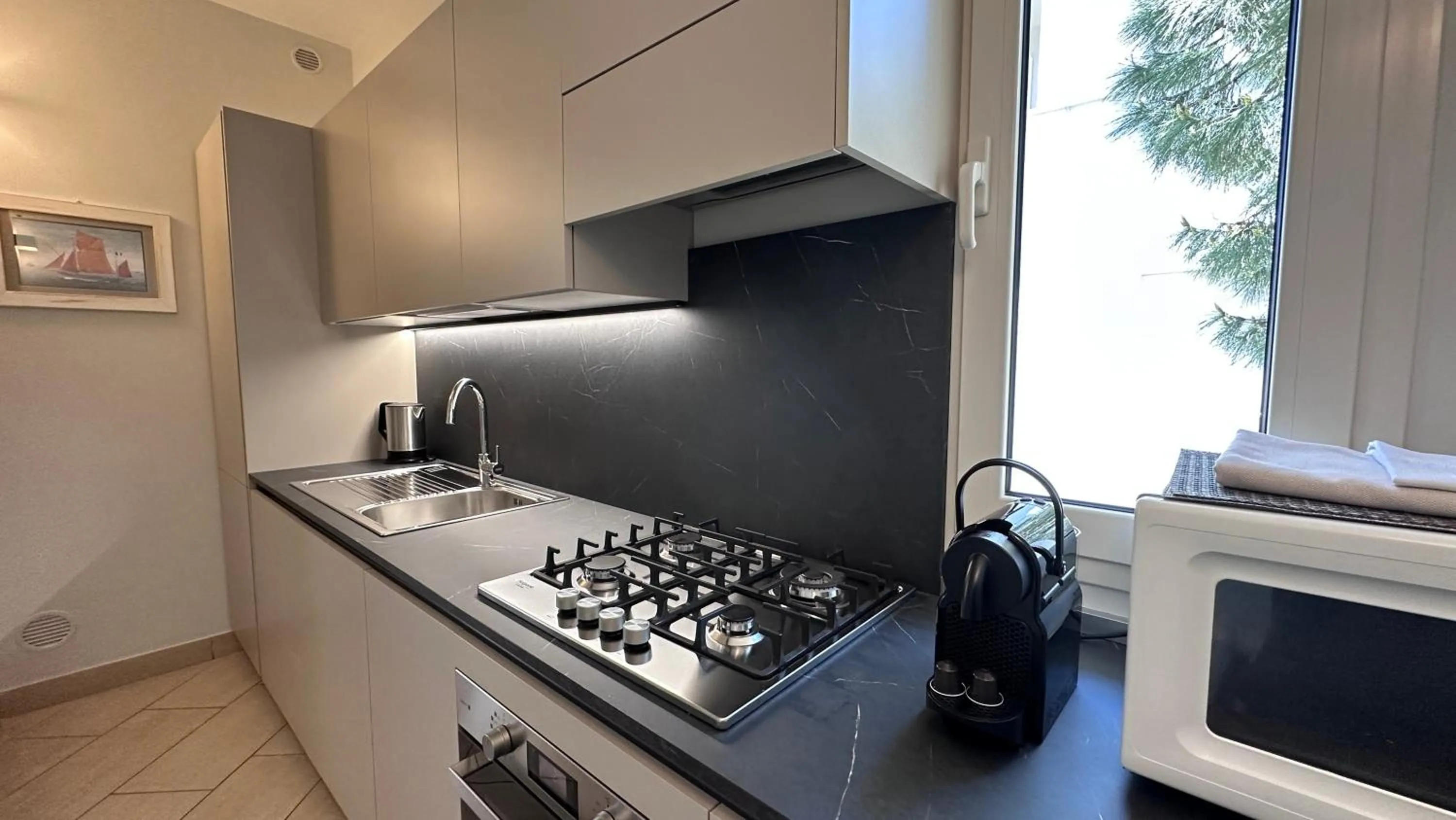 Kitchen or kitchenette in Residence Lungomare - Charming apartments
