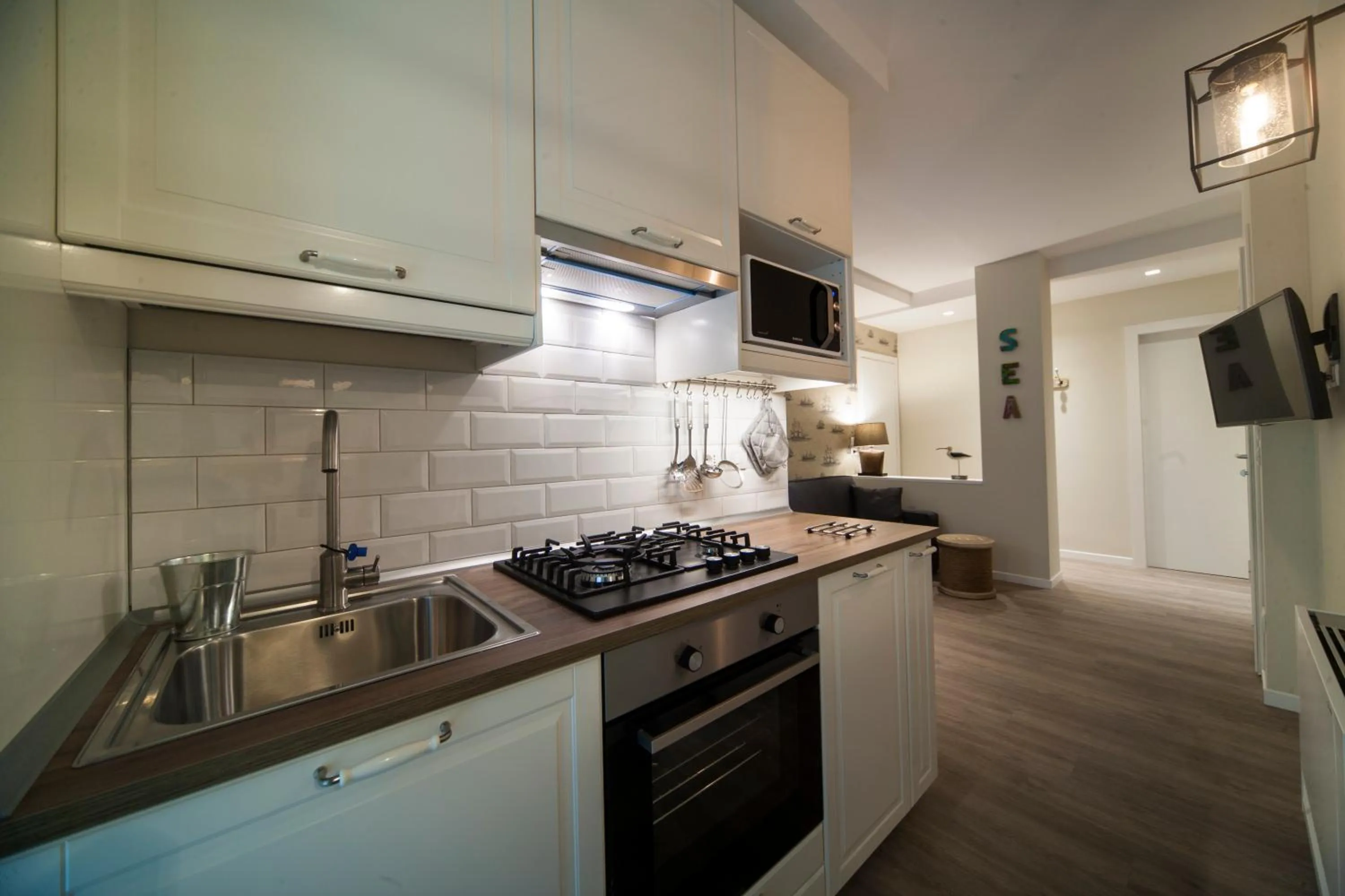 Kitchen or kitchenette in Residence Lungomare - Charming apartments