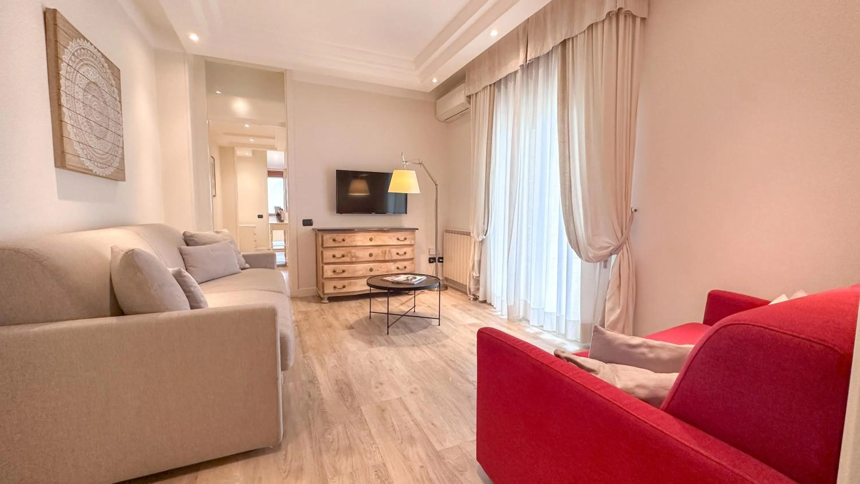 Communal lounge/ TV room in Residence Lungomare - Charming apartments