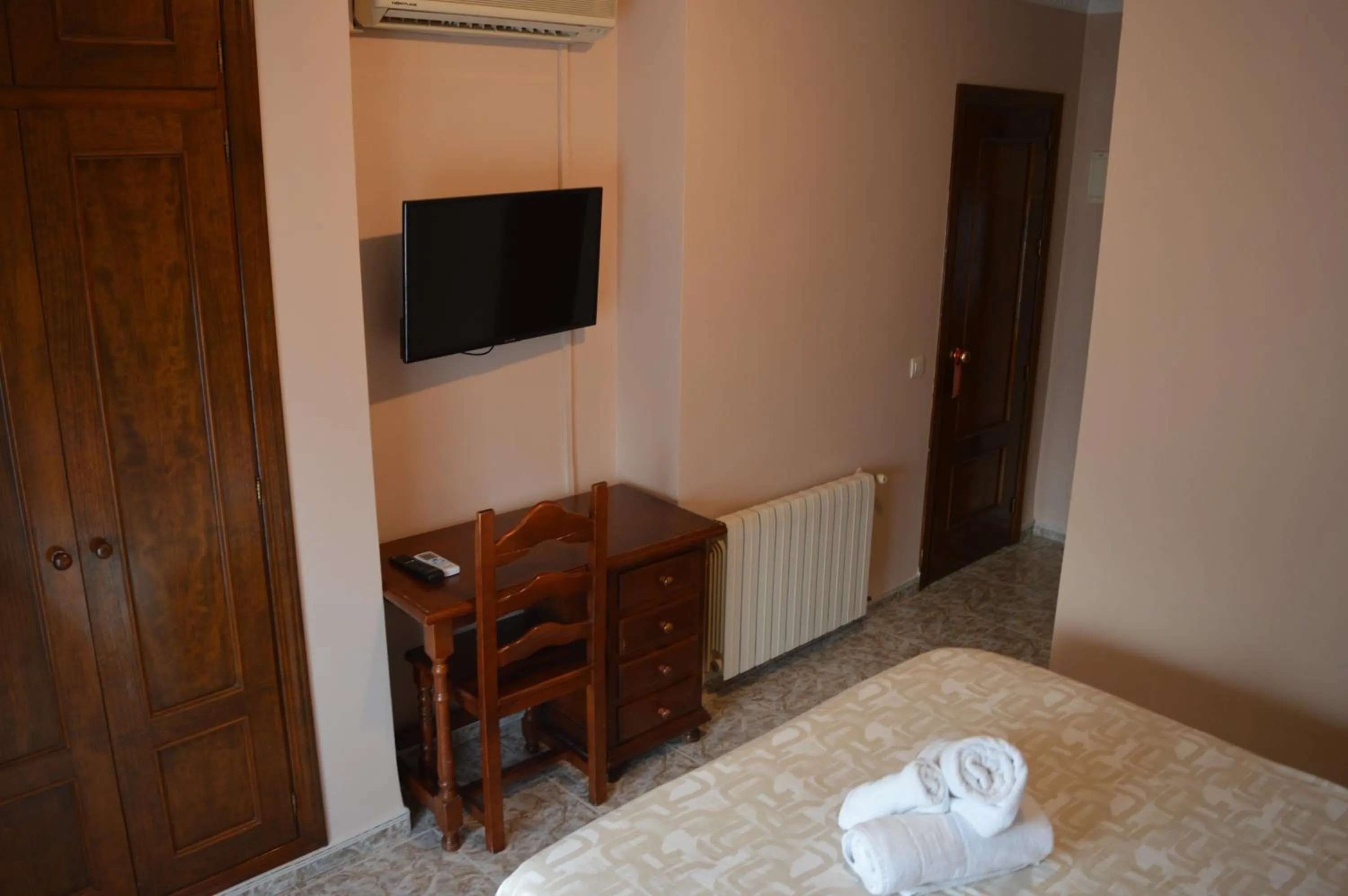 Bed in Hotel Doña Carmen