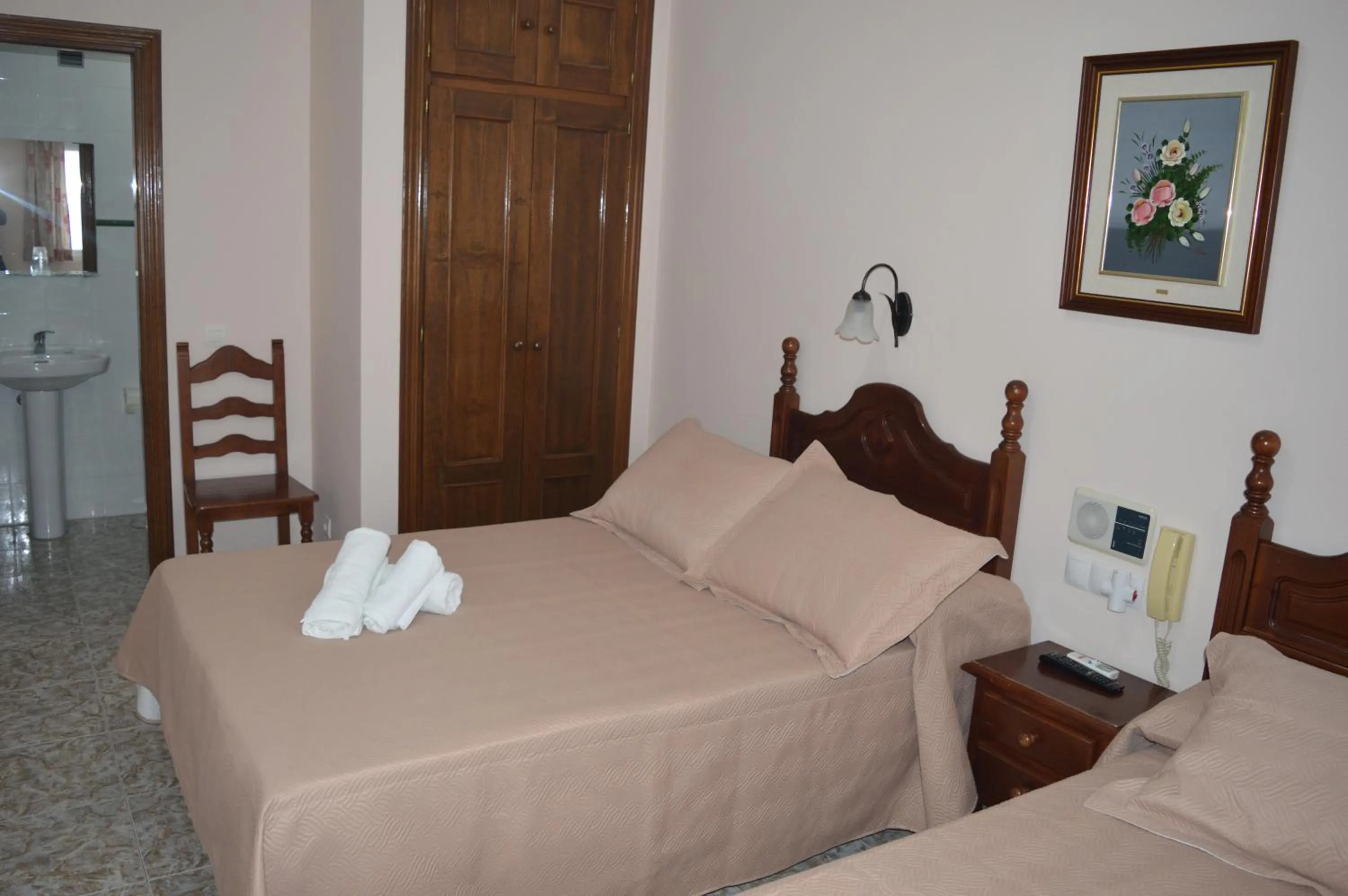 Bed in Hotel Doña Carmen