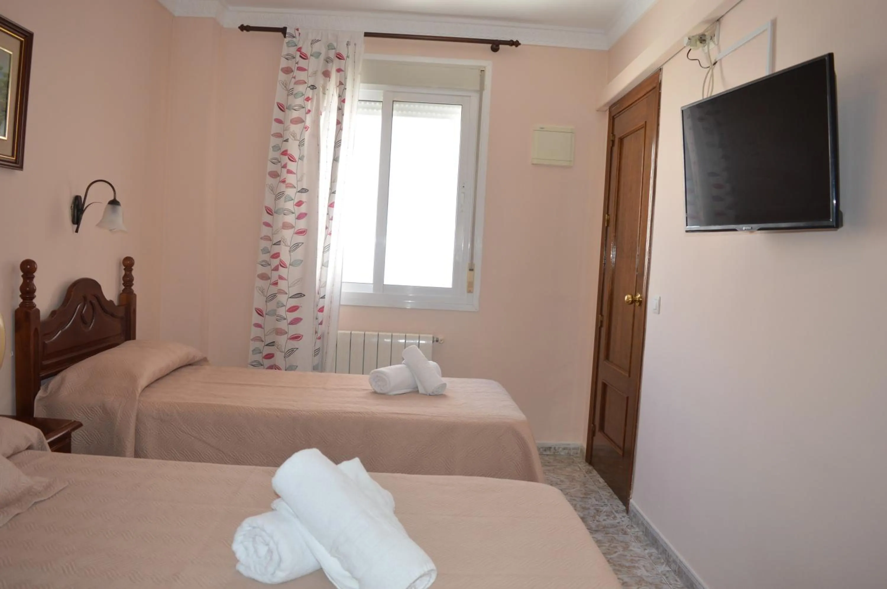 Bed in Hotel Doña Carmen