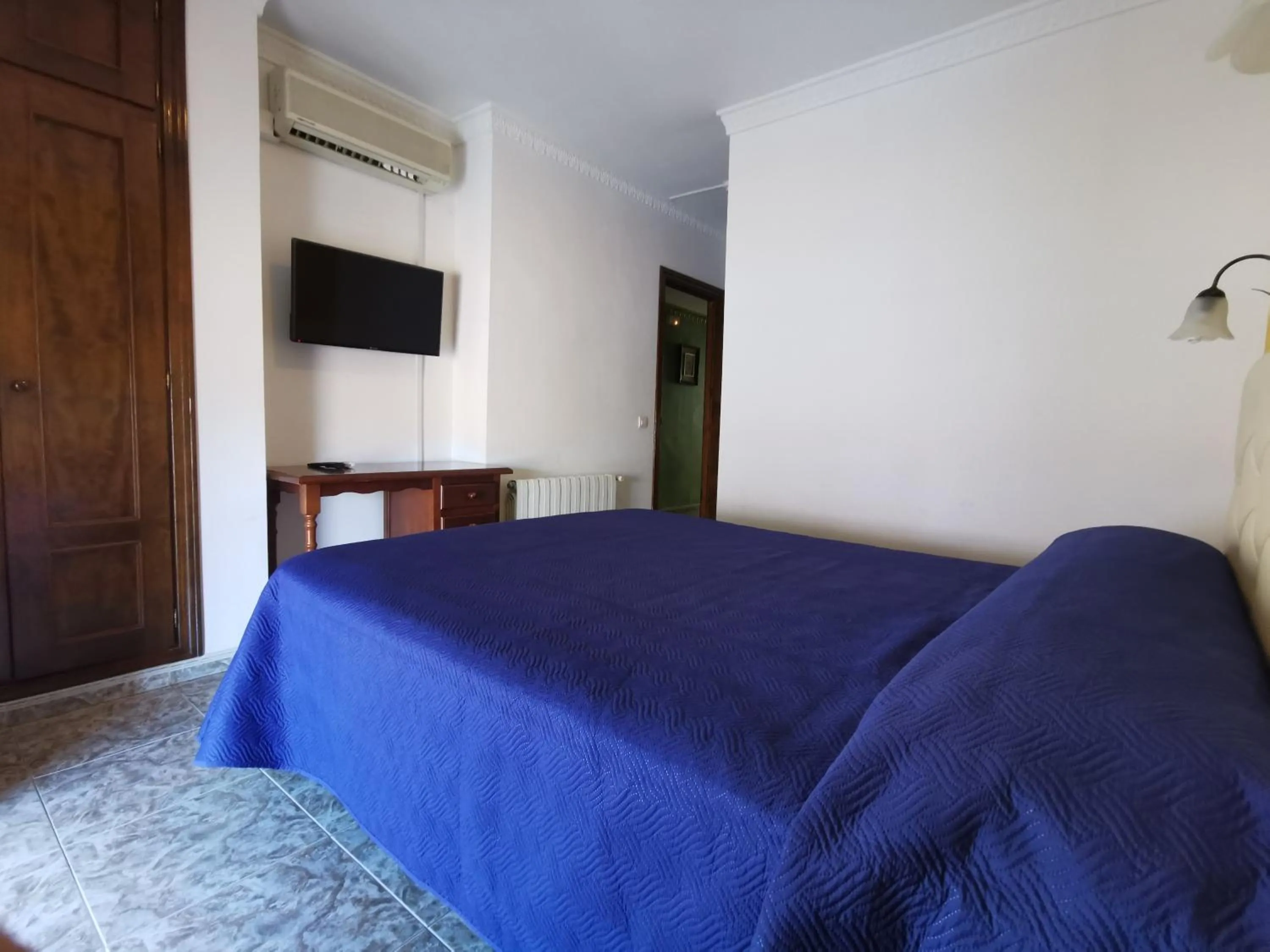 Bed in Hotel Doña Carmen