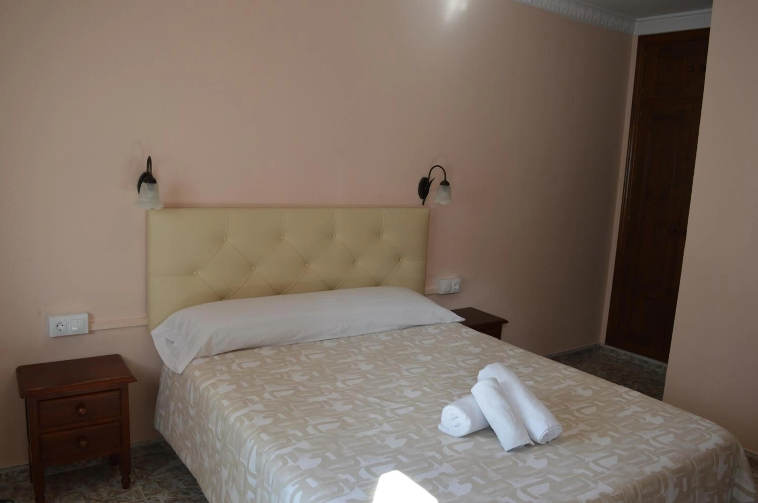 Bed in Hotel Doña Carmen