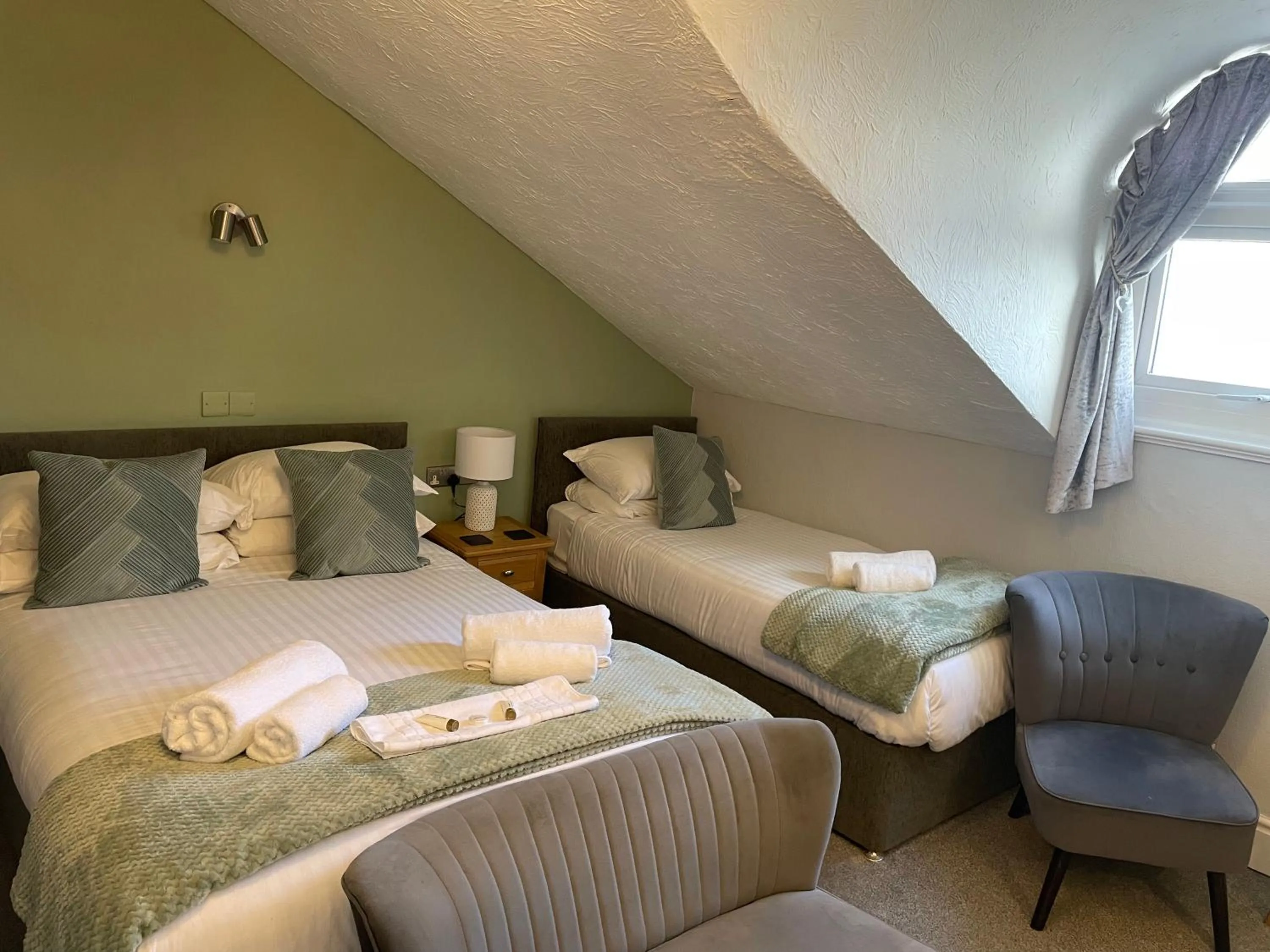 Bed in The Wildings Hotel & Tudno's Restaurant