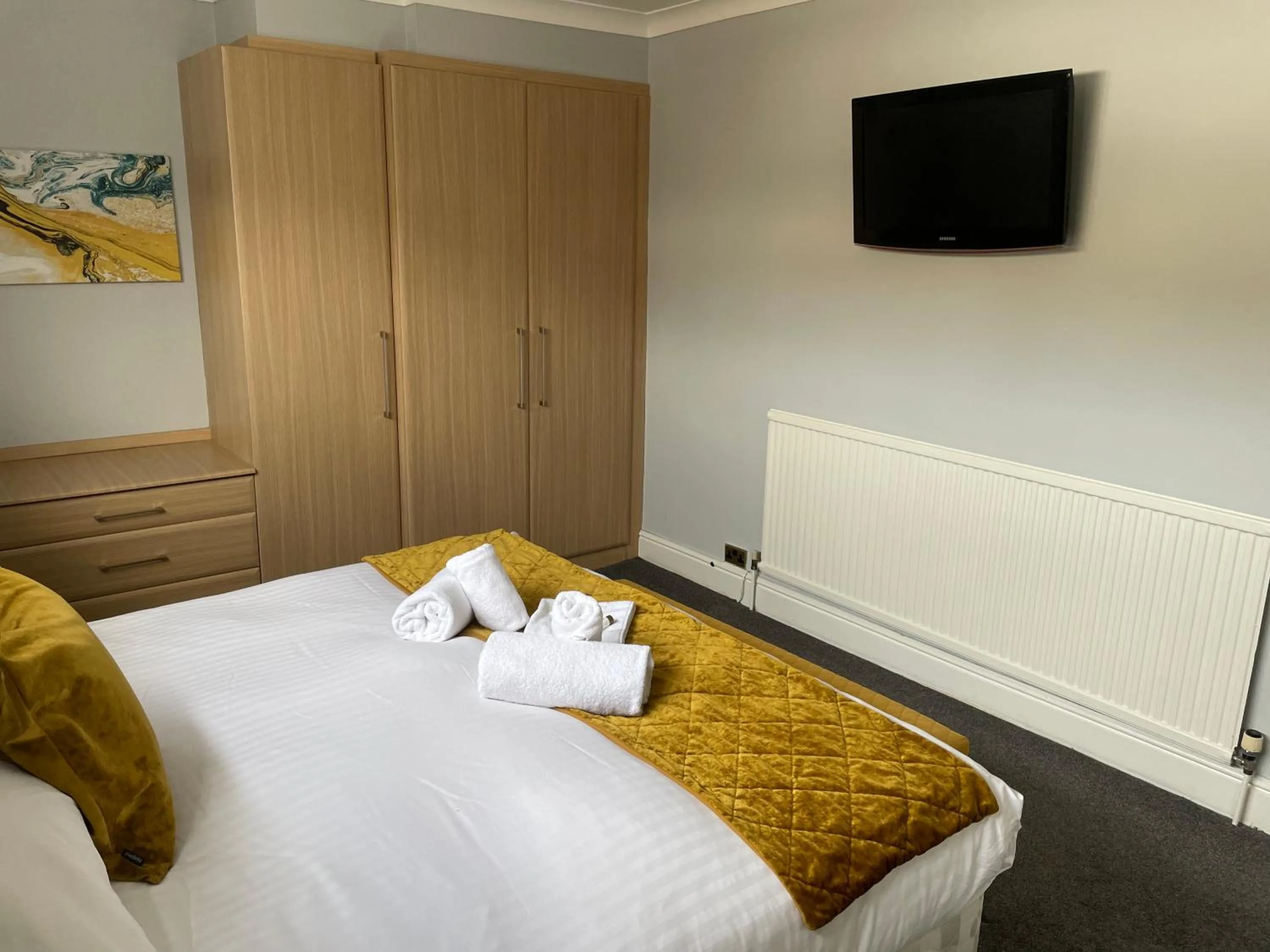 Bed in The Wildings Hotel & Tudno's Restaurant