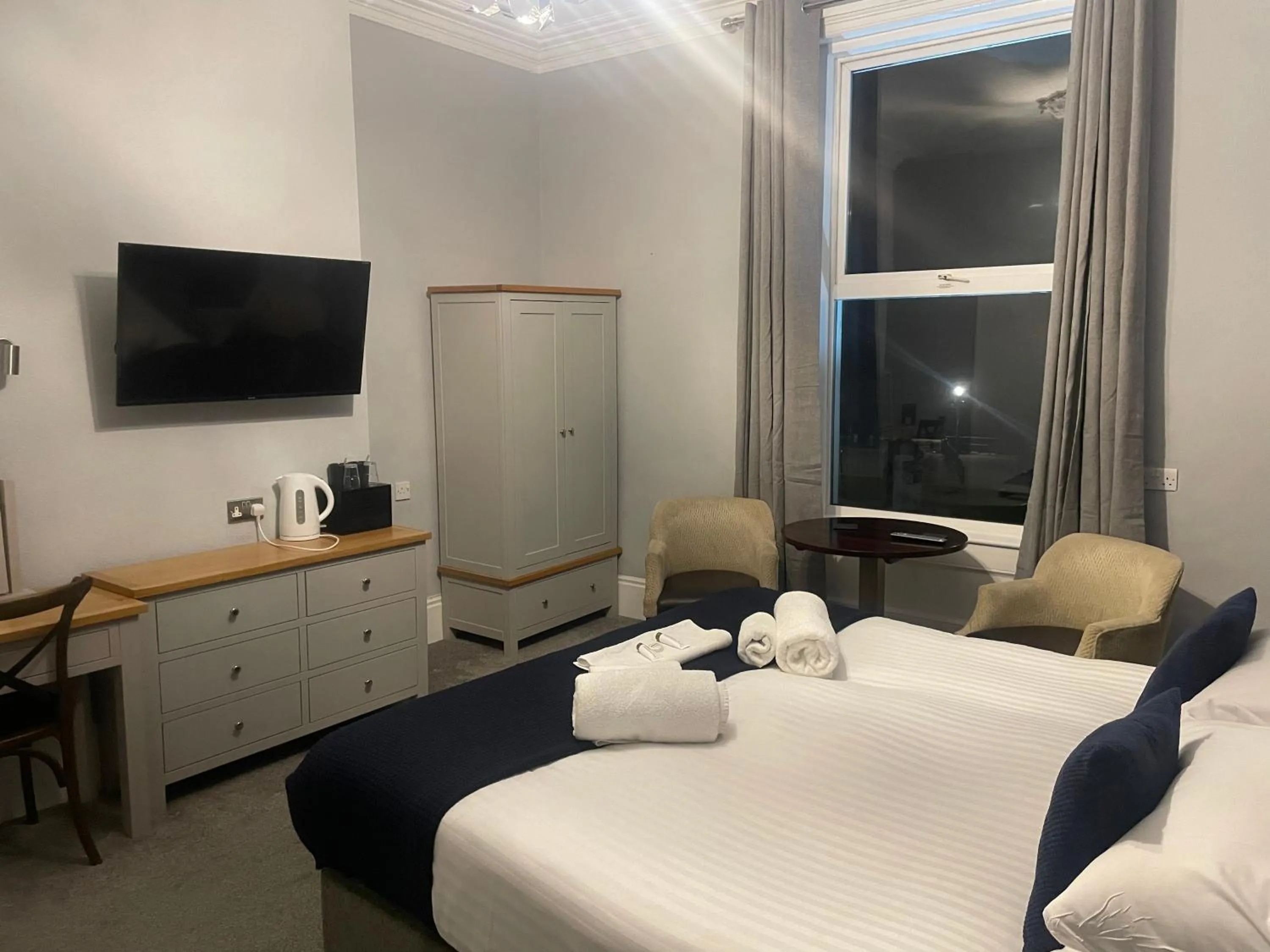 Bed in The Wildings Hotel & Tudno's Restaurant