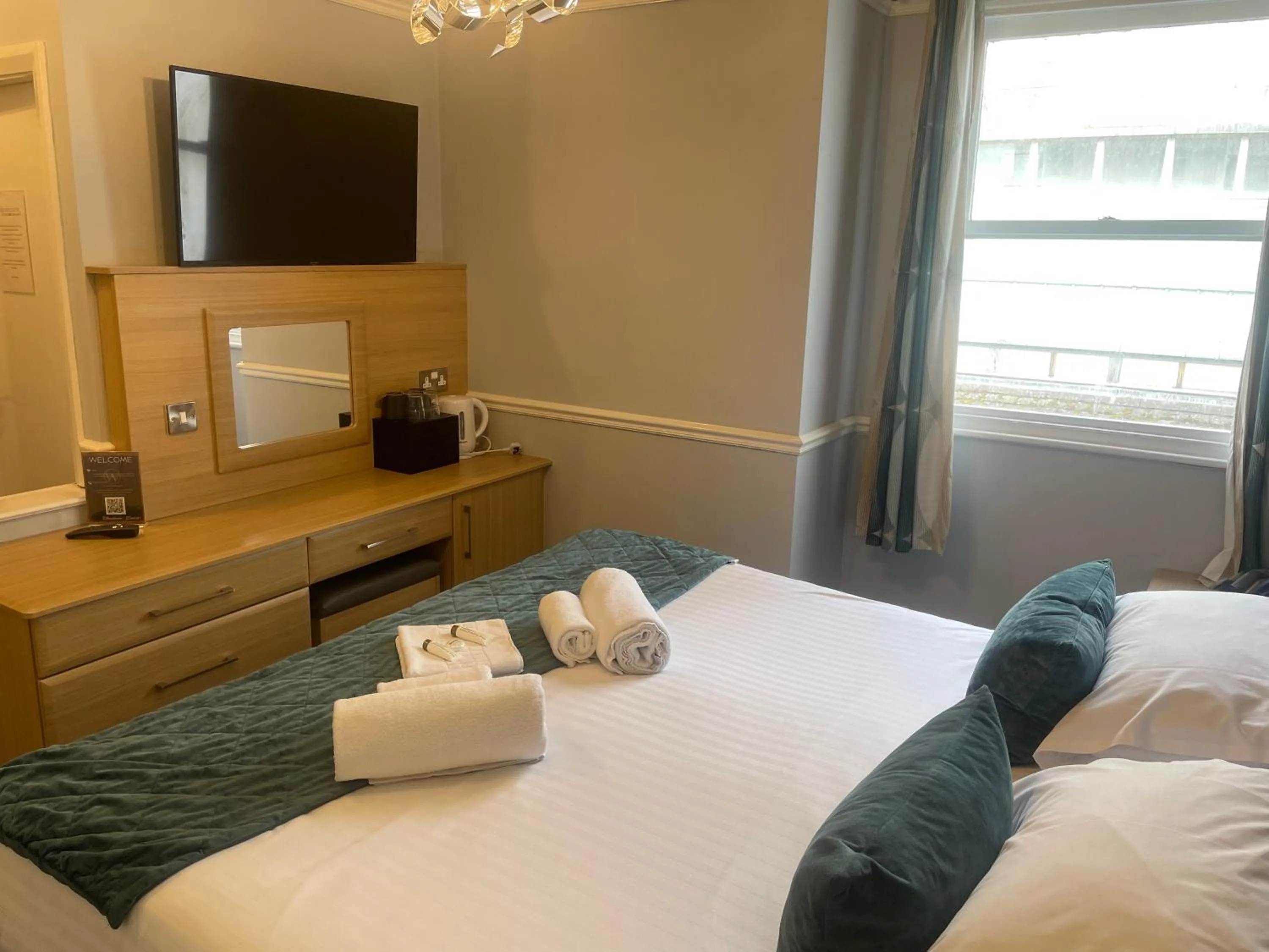 Bed in The Wildings Hotel & Tudno's Restaurant