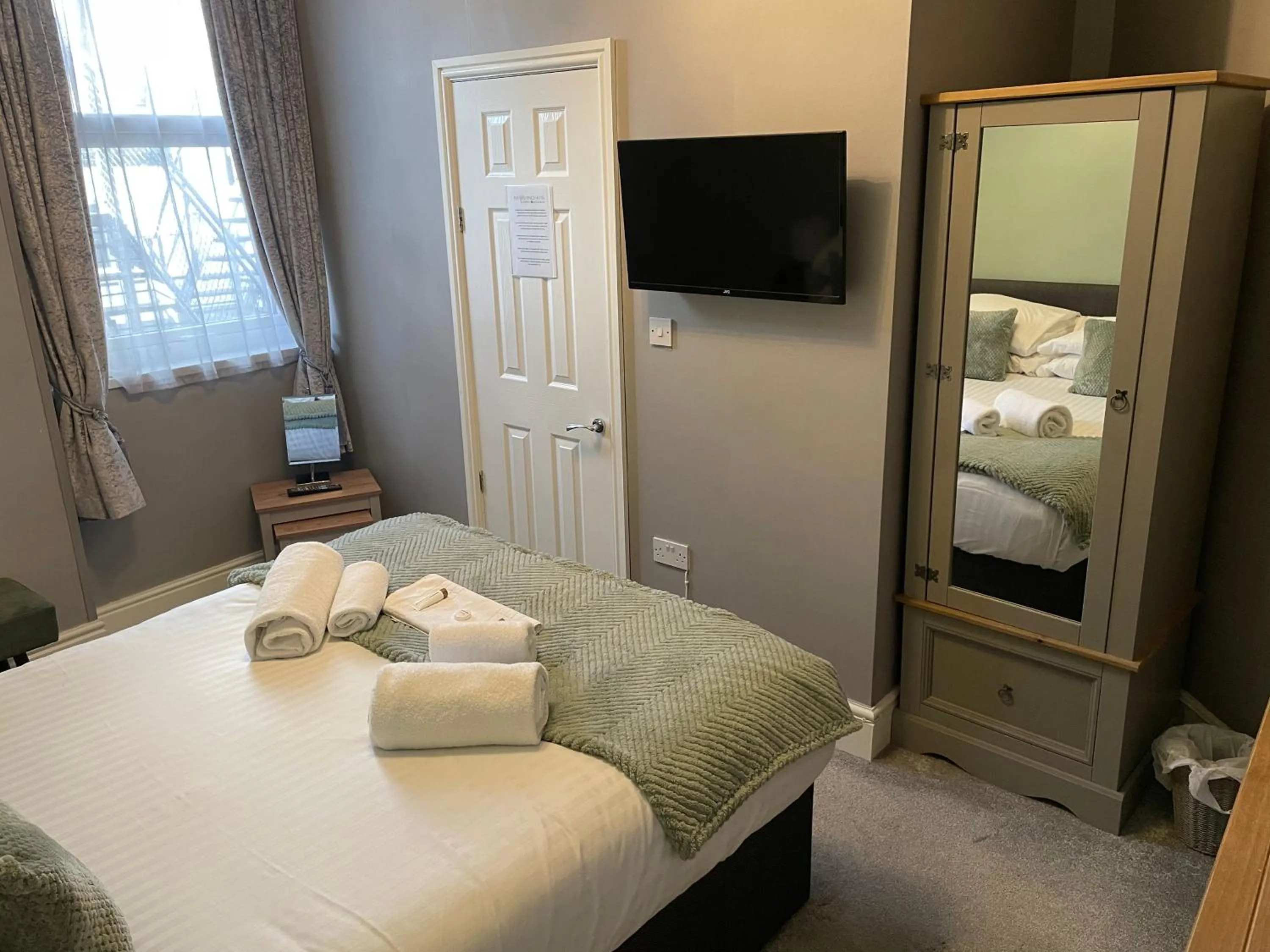 Bed in The Wildings Hotel & Tudno's Restaurant