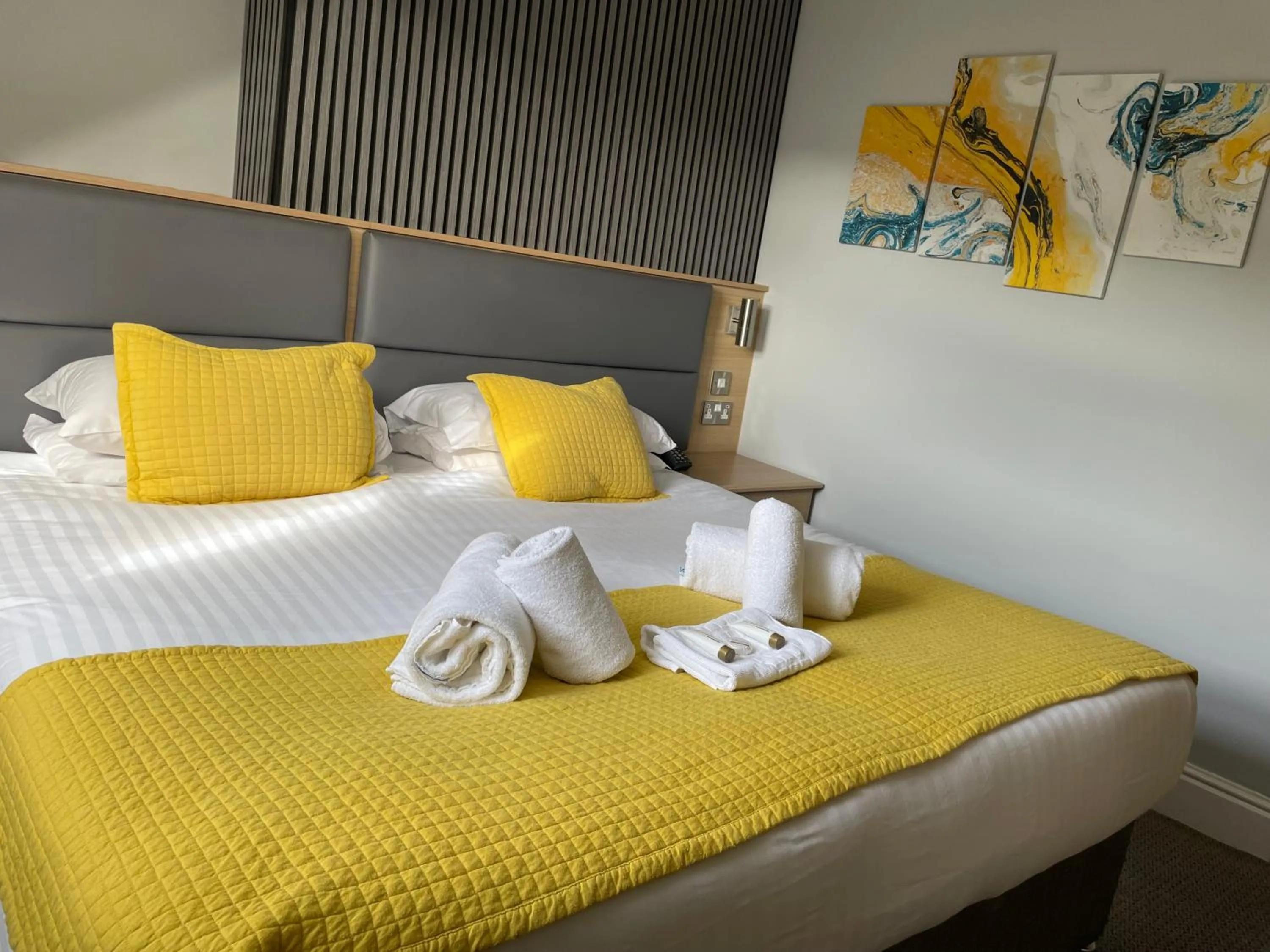 Bed in The Wildings Hotel & Tudno's Restaurant
