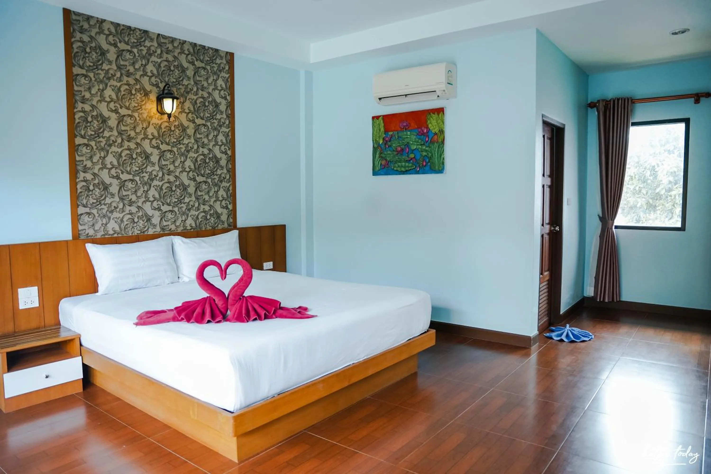 Bed in Chomview Lanta Water Park Resort