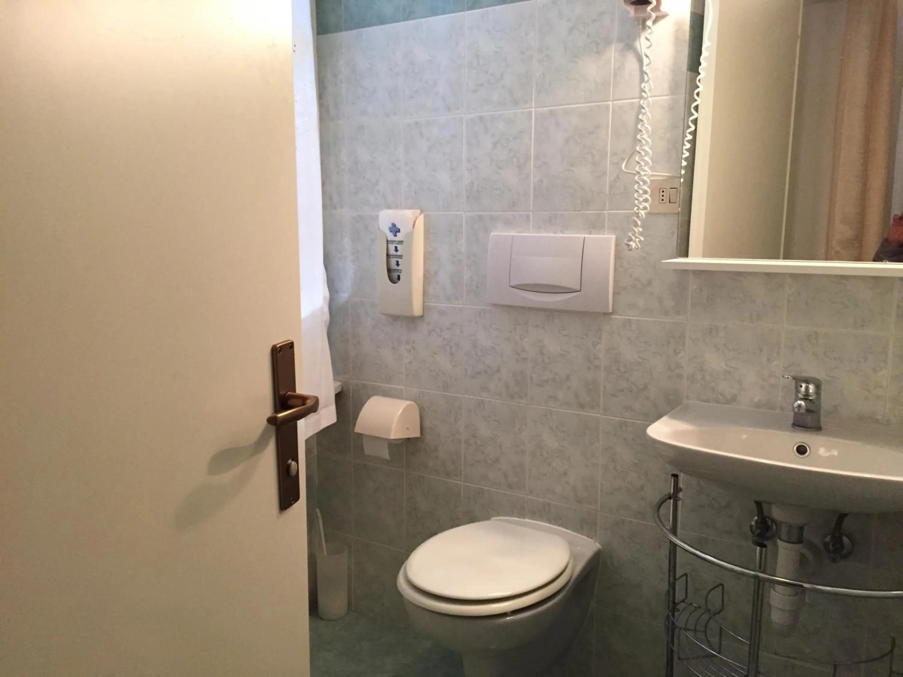 Bathroom in Hotel Plinio