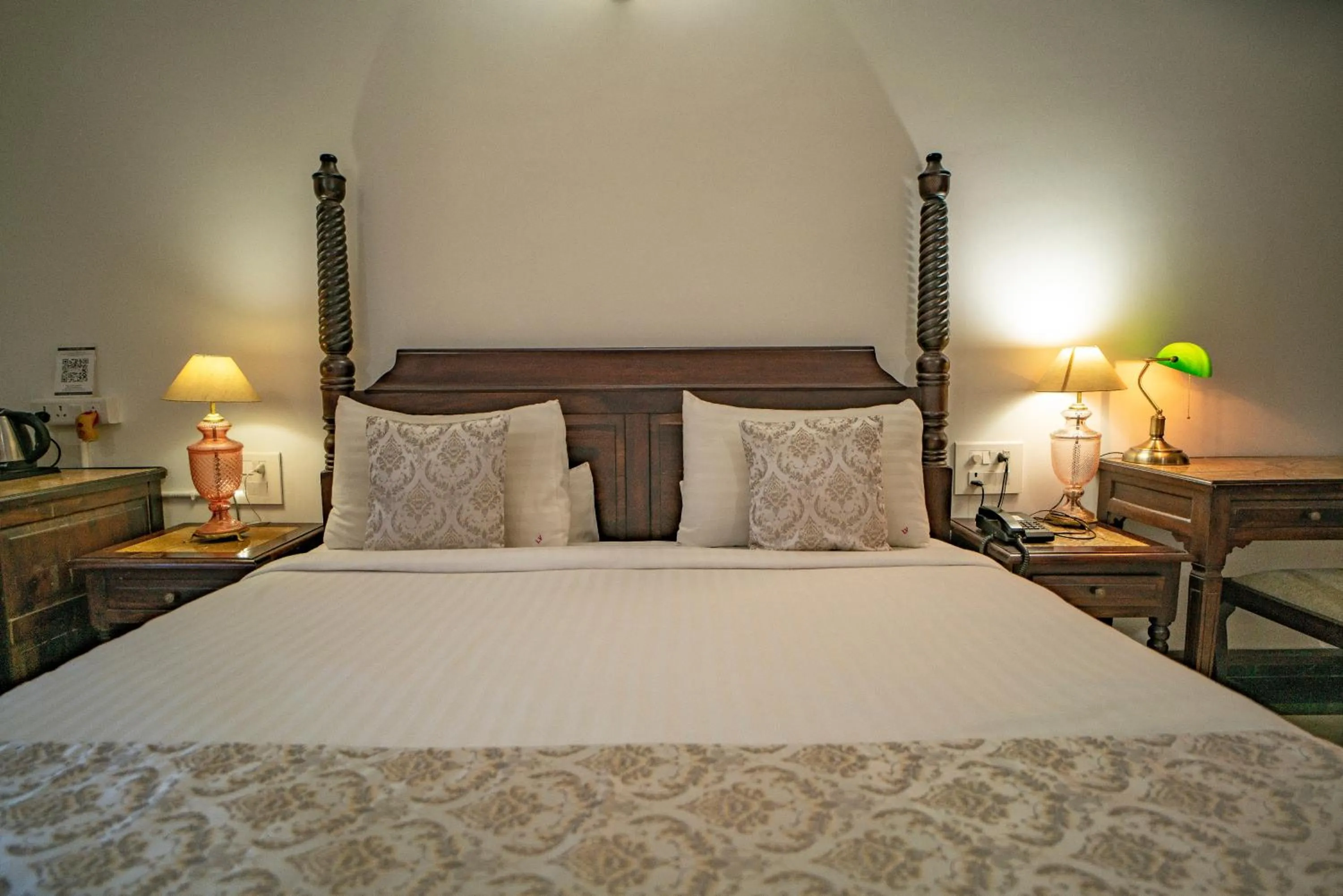 Bed in The Lavitra Lakeview Hotel