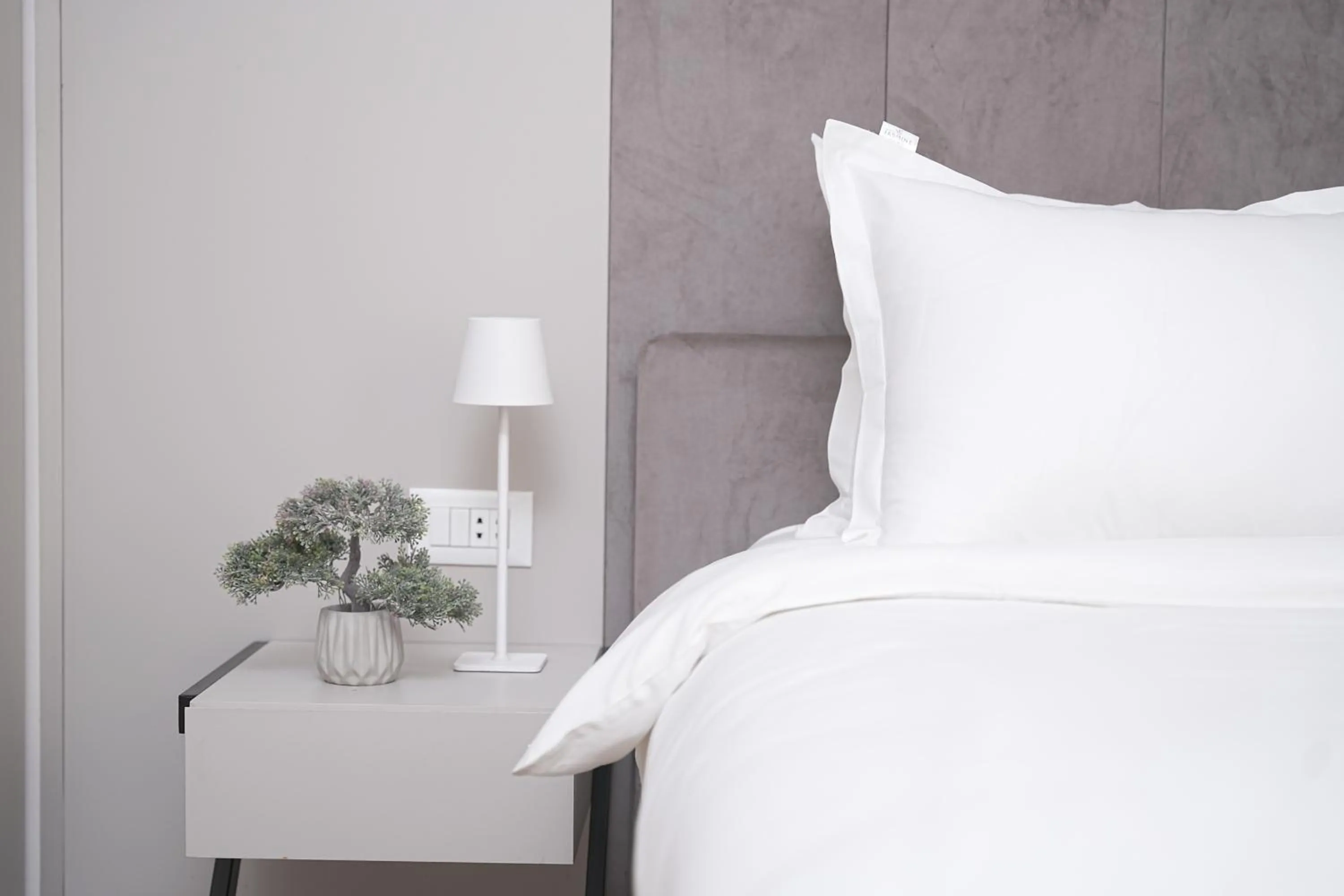 Bed in Sweet Home Deluxe Apart-Hotel