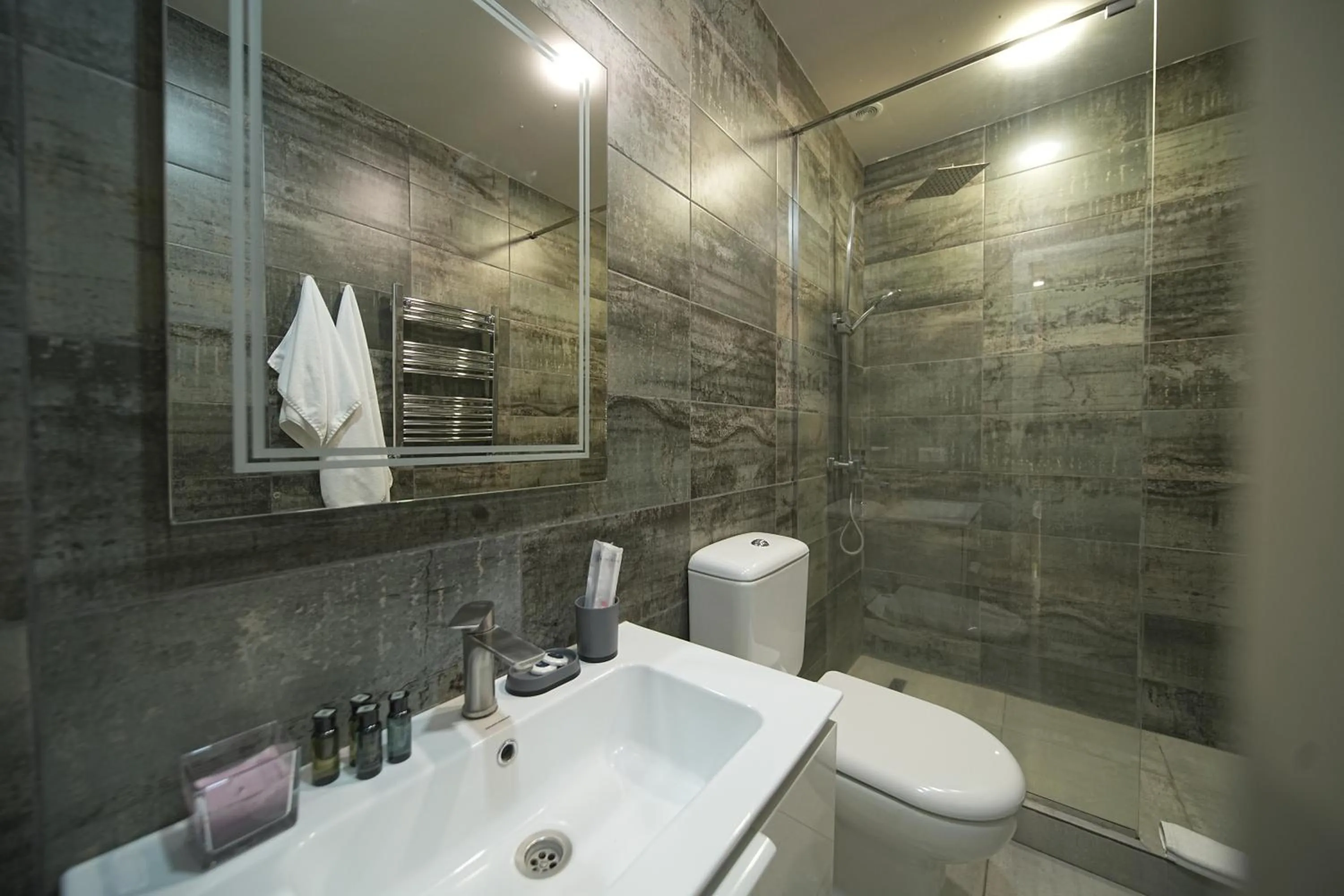 Shower in Sweet Home Deluxe Apart-Hotel