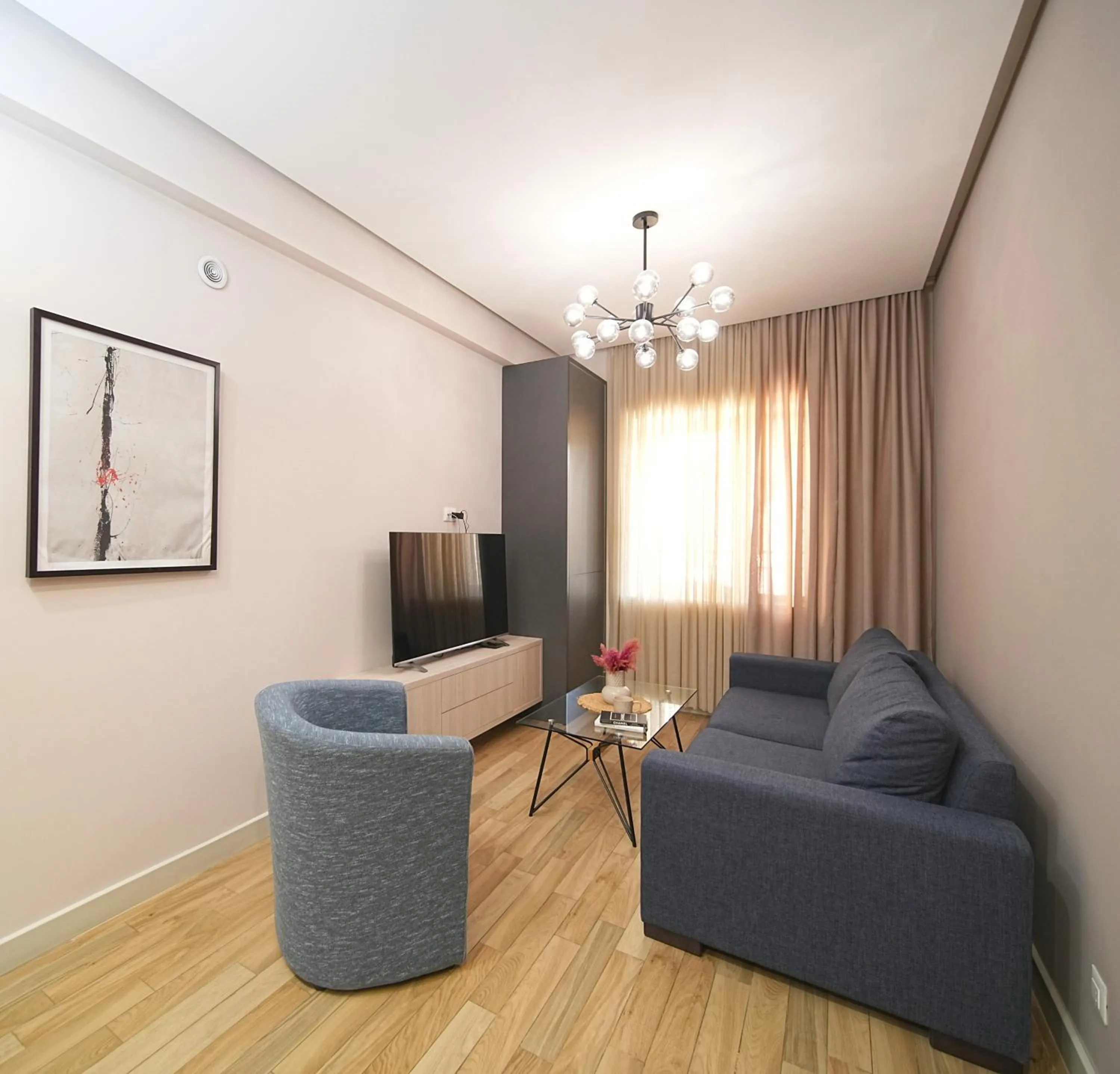 TV and multimedia in Sweet Home Deluxe Apart-Hotel