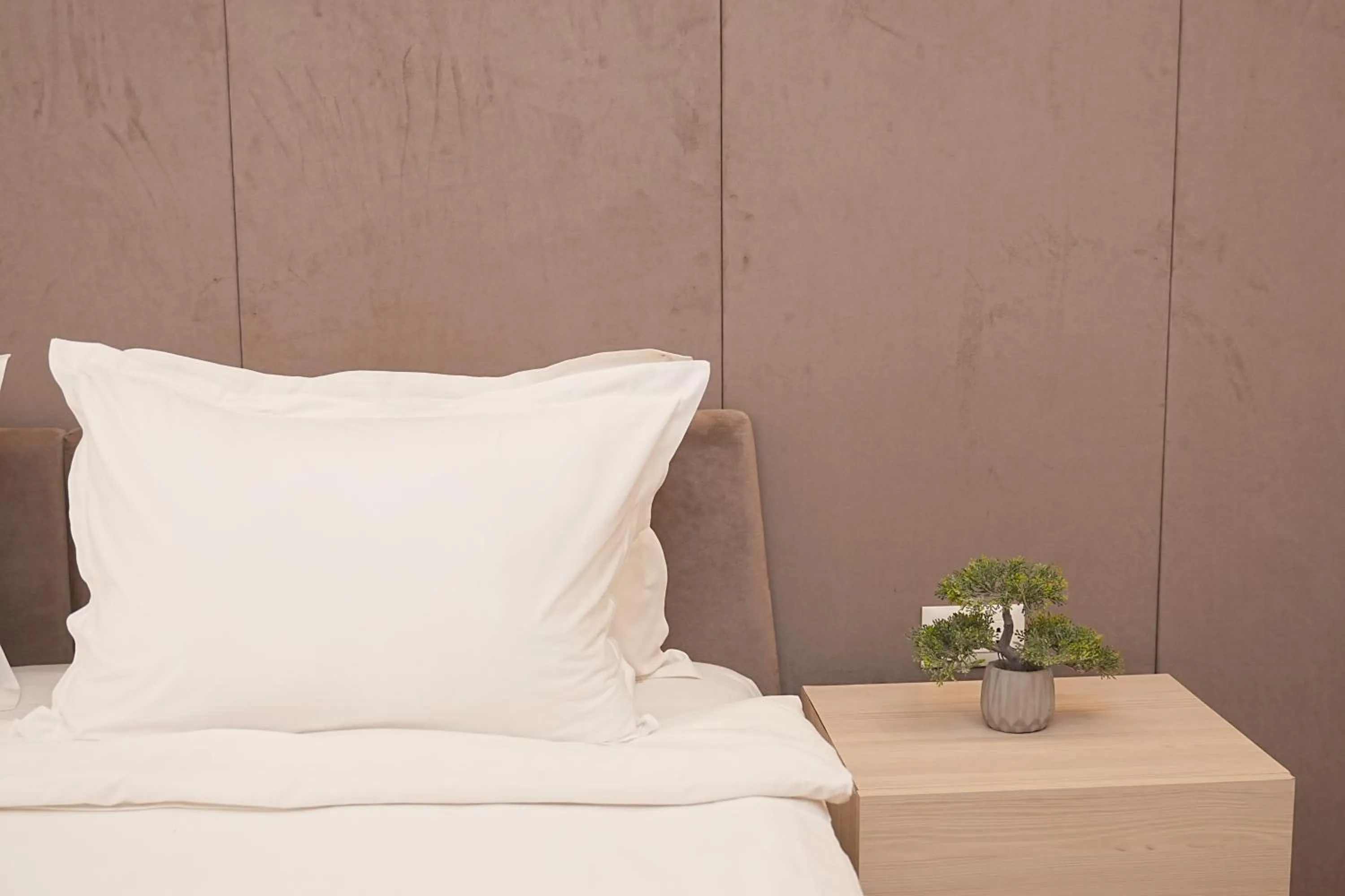 Bed in Sweet Home Deluxe Apart-Hotel