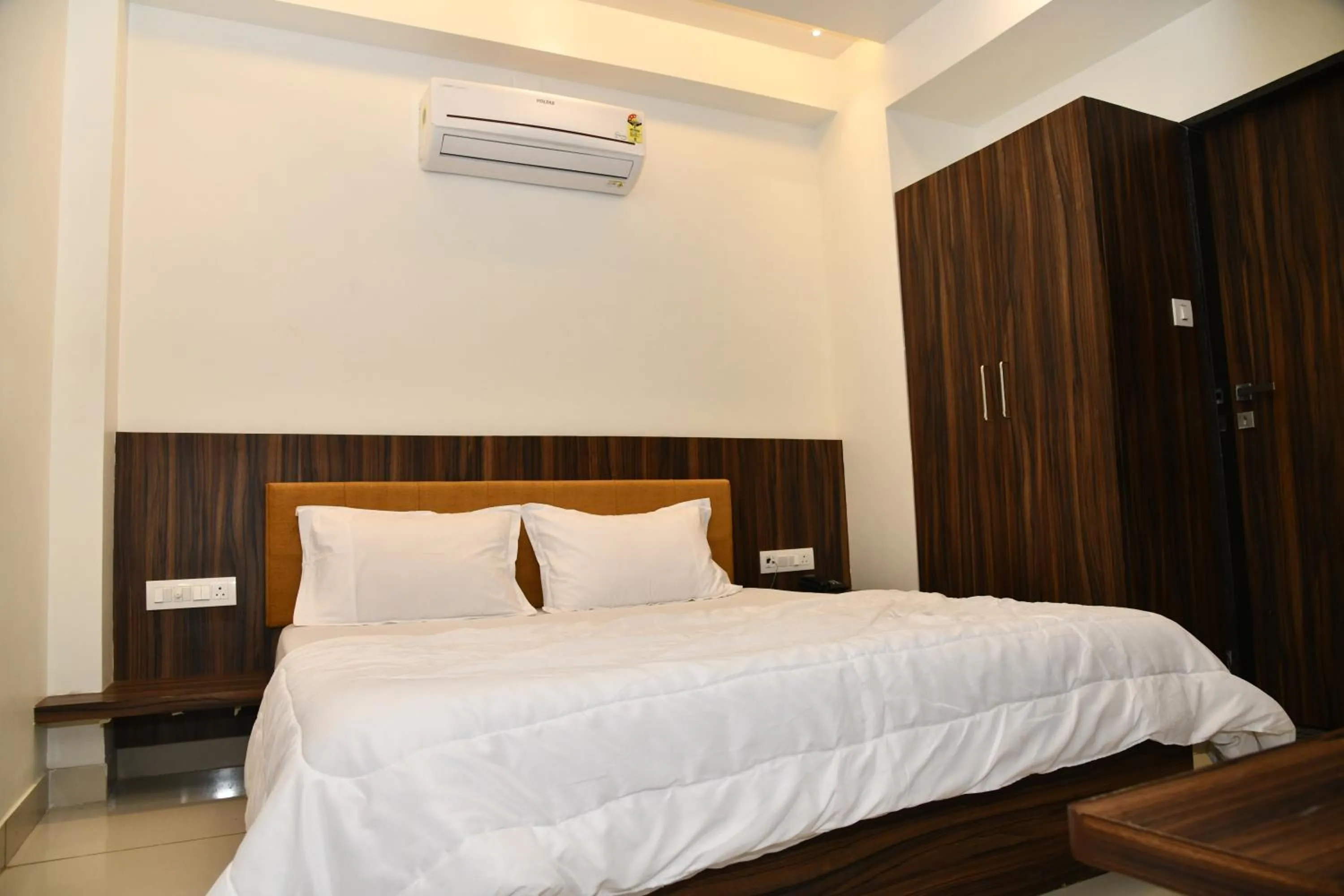 Bed in Hotel Shreeji Palace