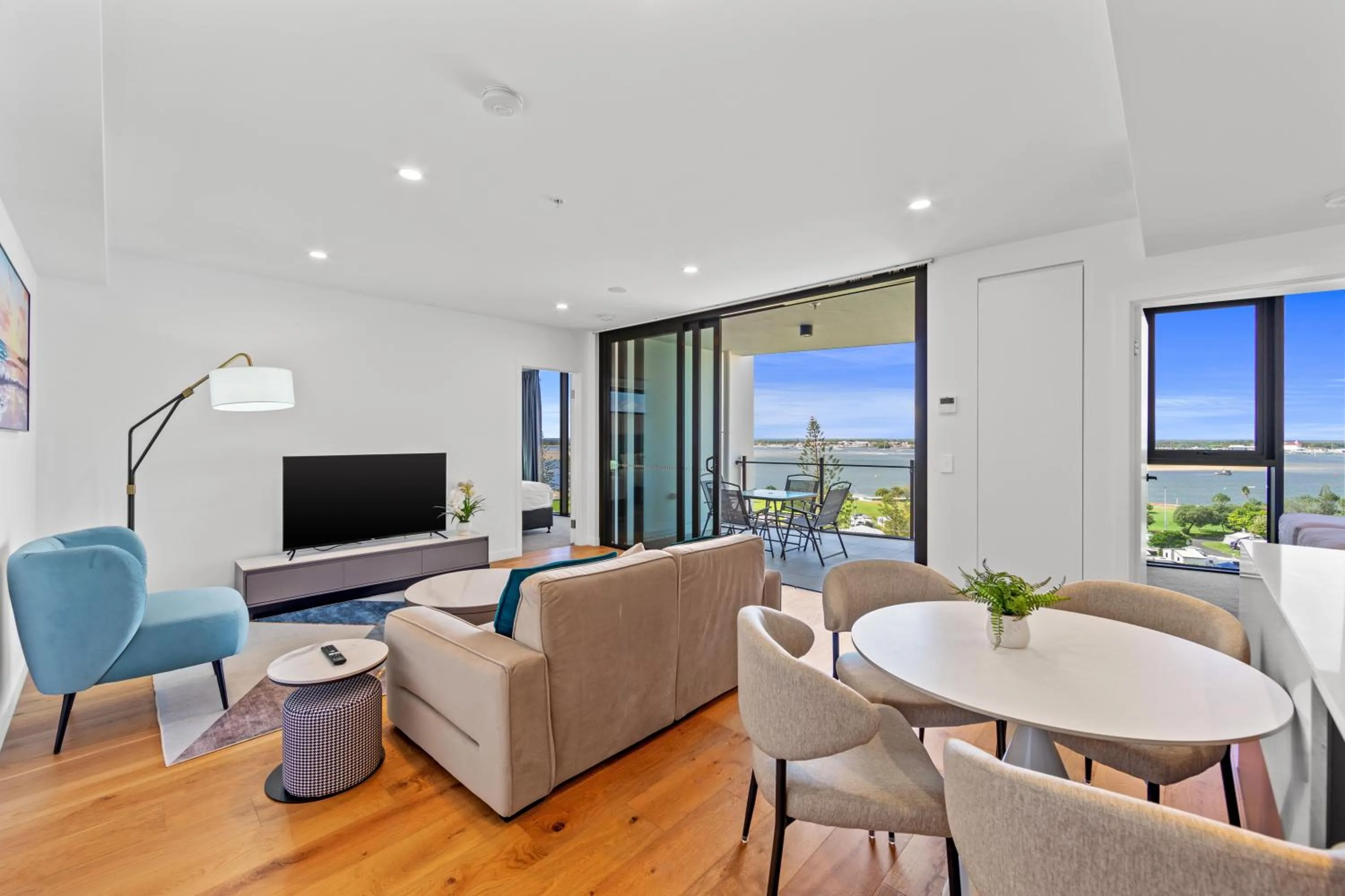 Living room in Marine Quarter Apartments by CLLIX
