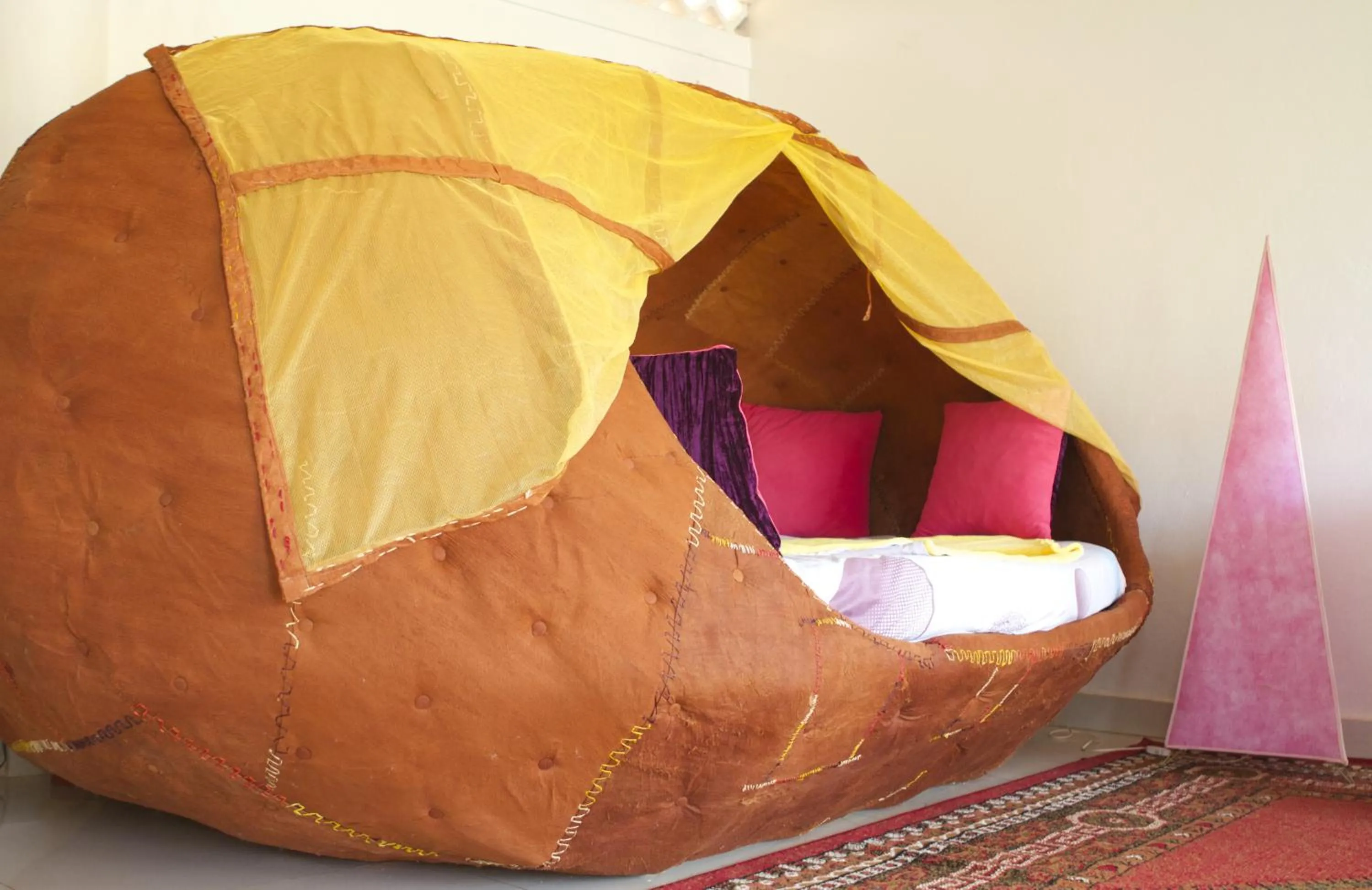 Bed in Malakai Eco Lodge