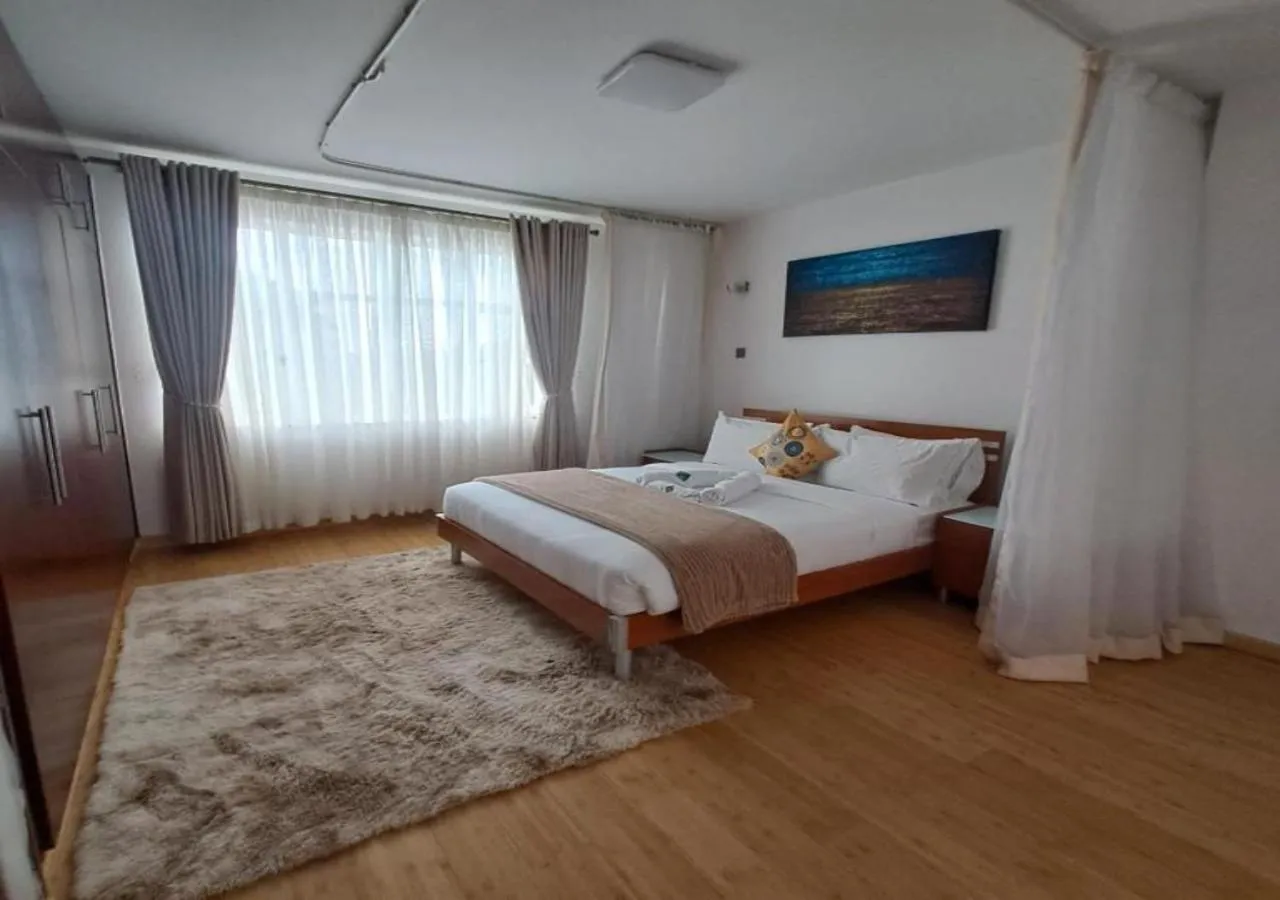 Bed in Golf View Serviced Apartments