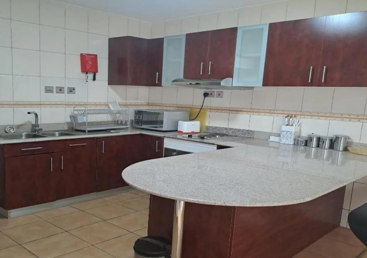 Kitchen or kitchenette in Golf View Serviced Apartments