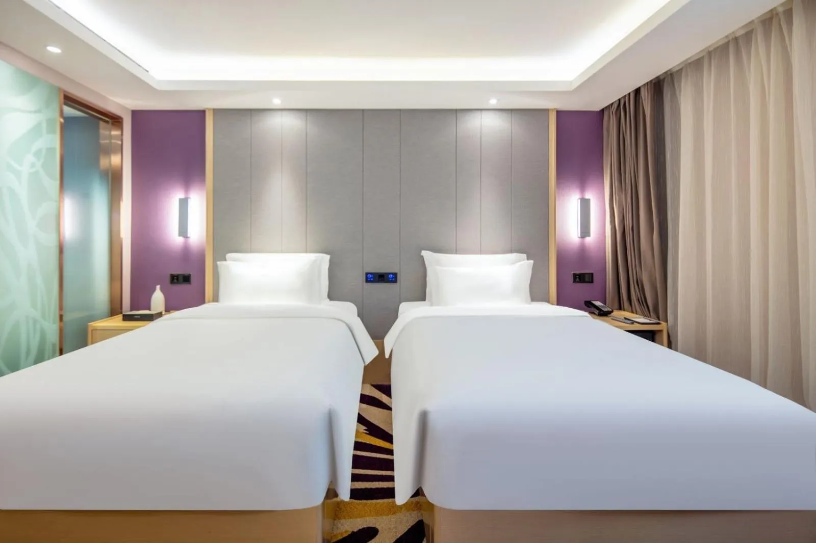 Bed in Lavande Hotel Beijing Tiananmen Square Wangfujing Street Branch