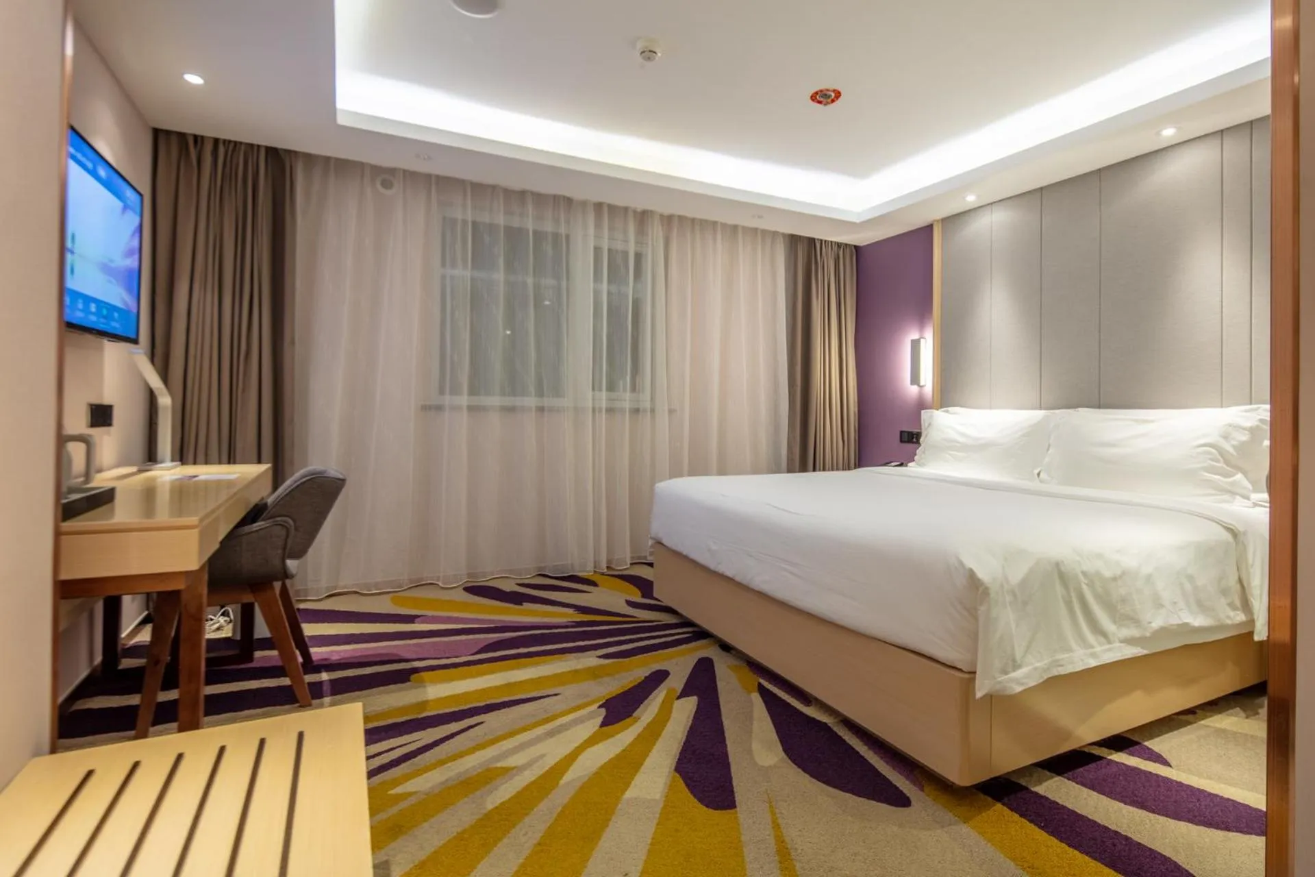 Bed in Lavande Hotel Beijing Tiananmen Square Wangfujing Street Branch