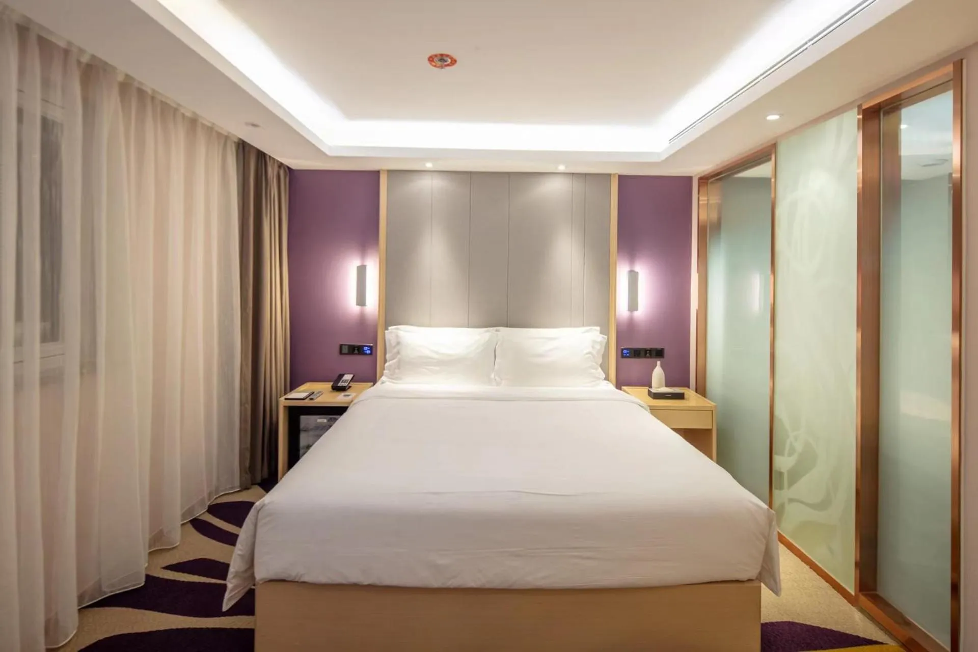 Bed in Lavande Hotel Beijing Tiananmen Square Wangfujing Street Branch