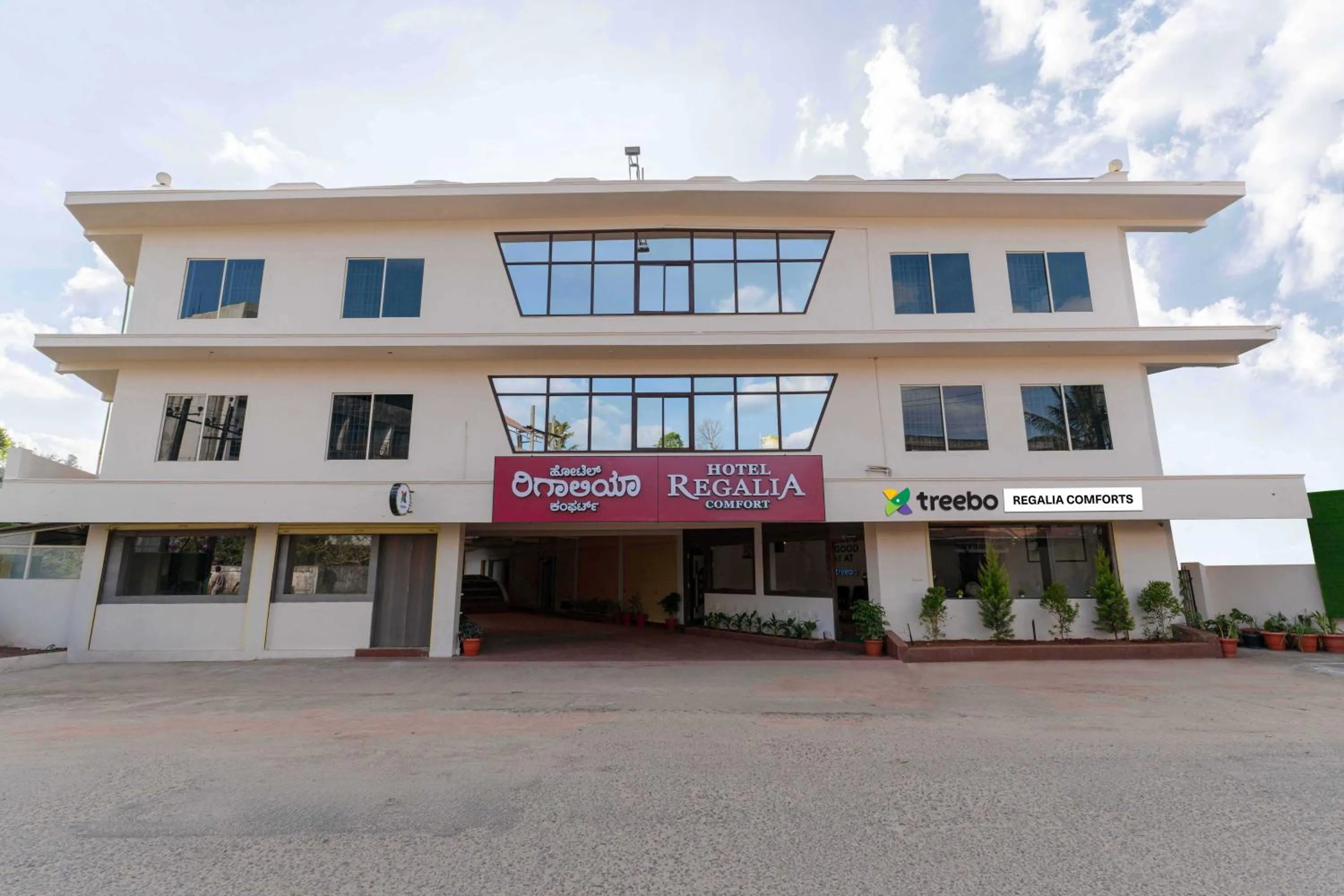 Property building in Treebo Regalia Comforts, 15 Mins From Abbey Waterfall