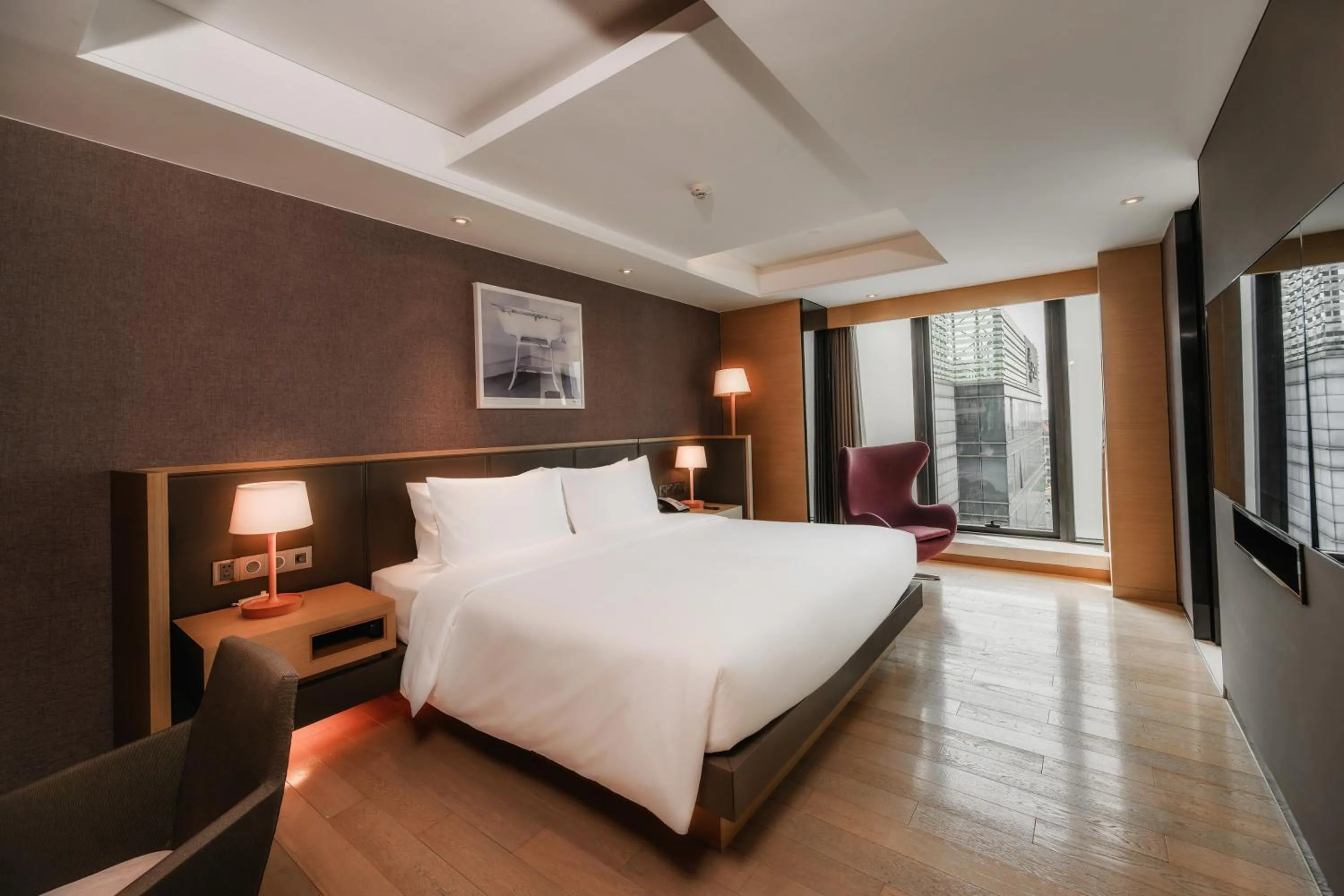 Bed in Grand Metropark Hotel Shanghai Pudong
