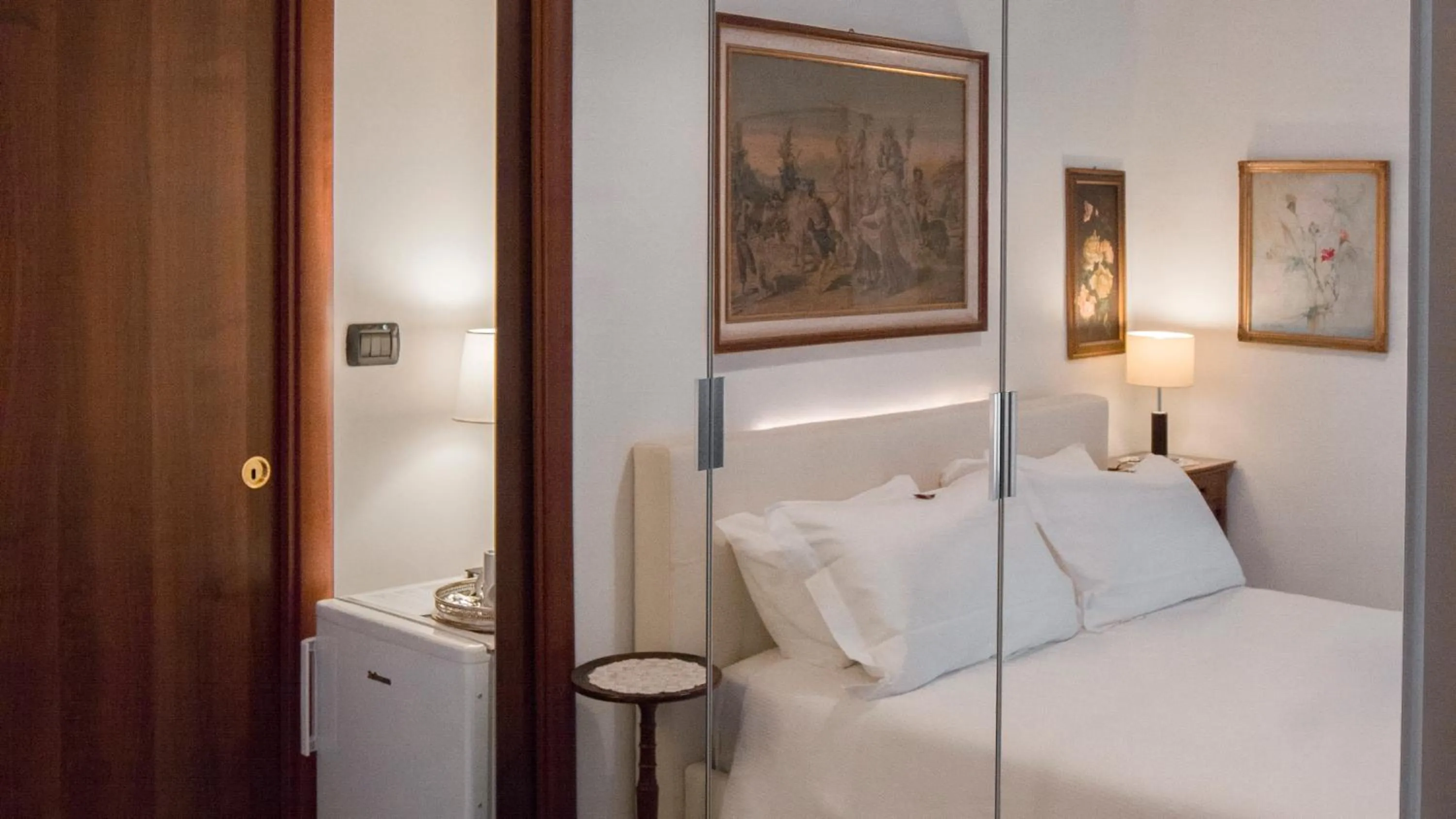 Bed in Aiello Suites Milan