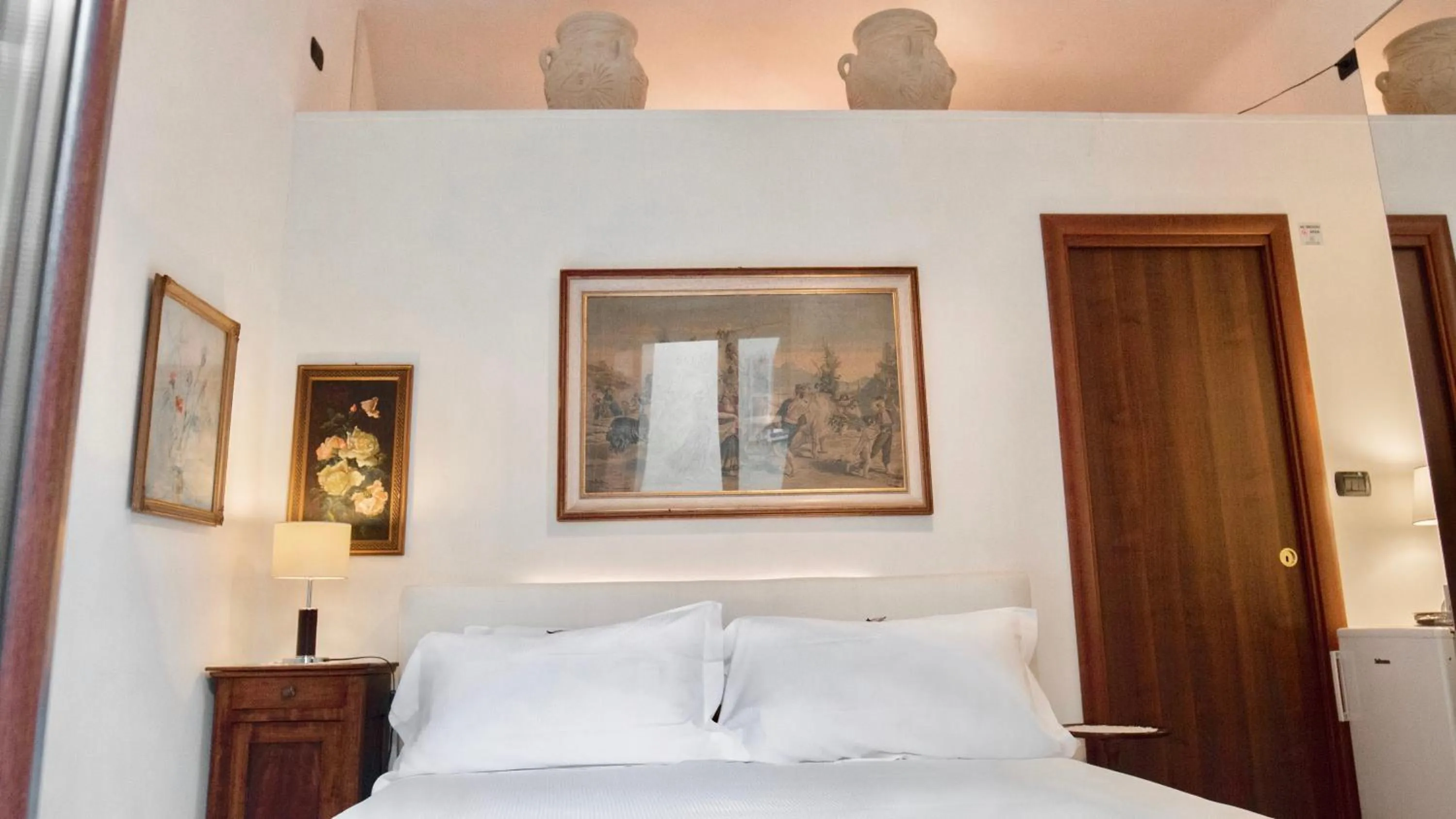 Bed in Aiello Suites Milan