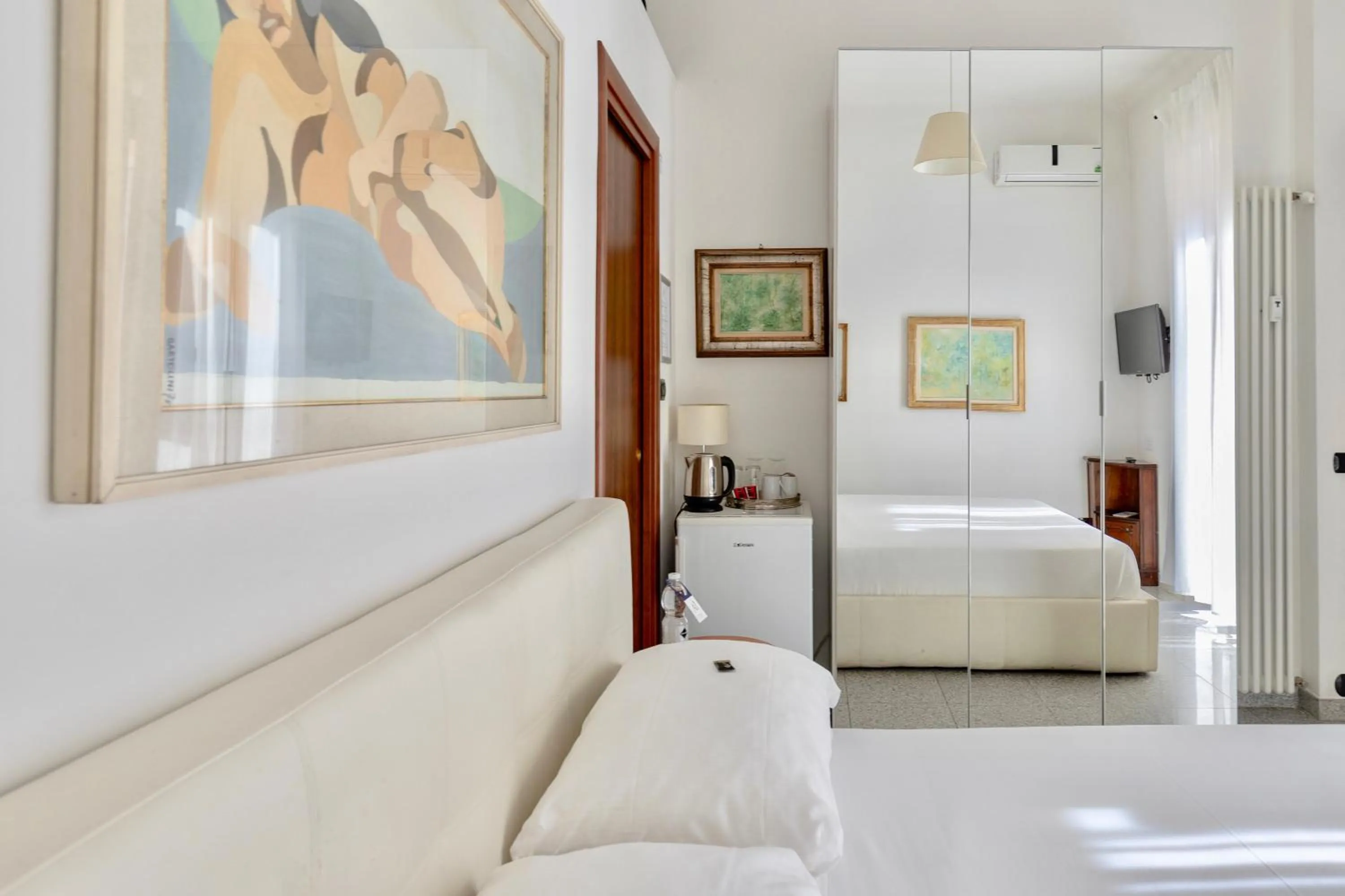 Bed in Aiello Suites Milan